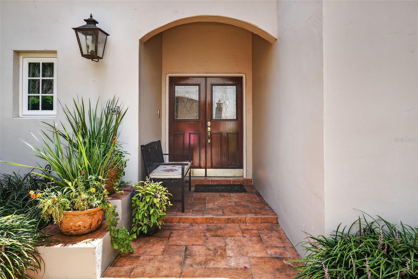 Let's start back at the covered front door entry