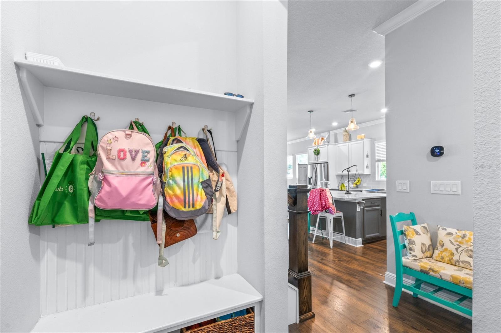 entry into home from the garage.  Drop your bags to keep things organized