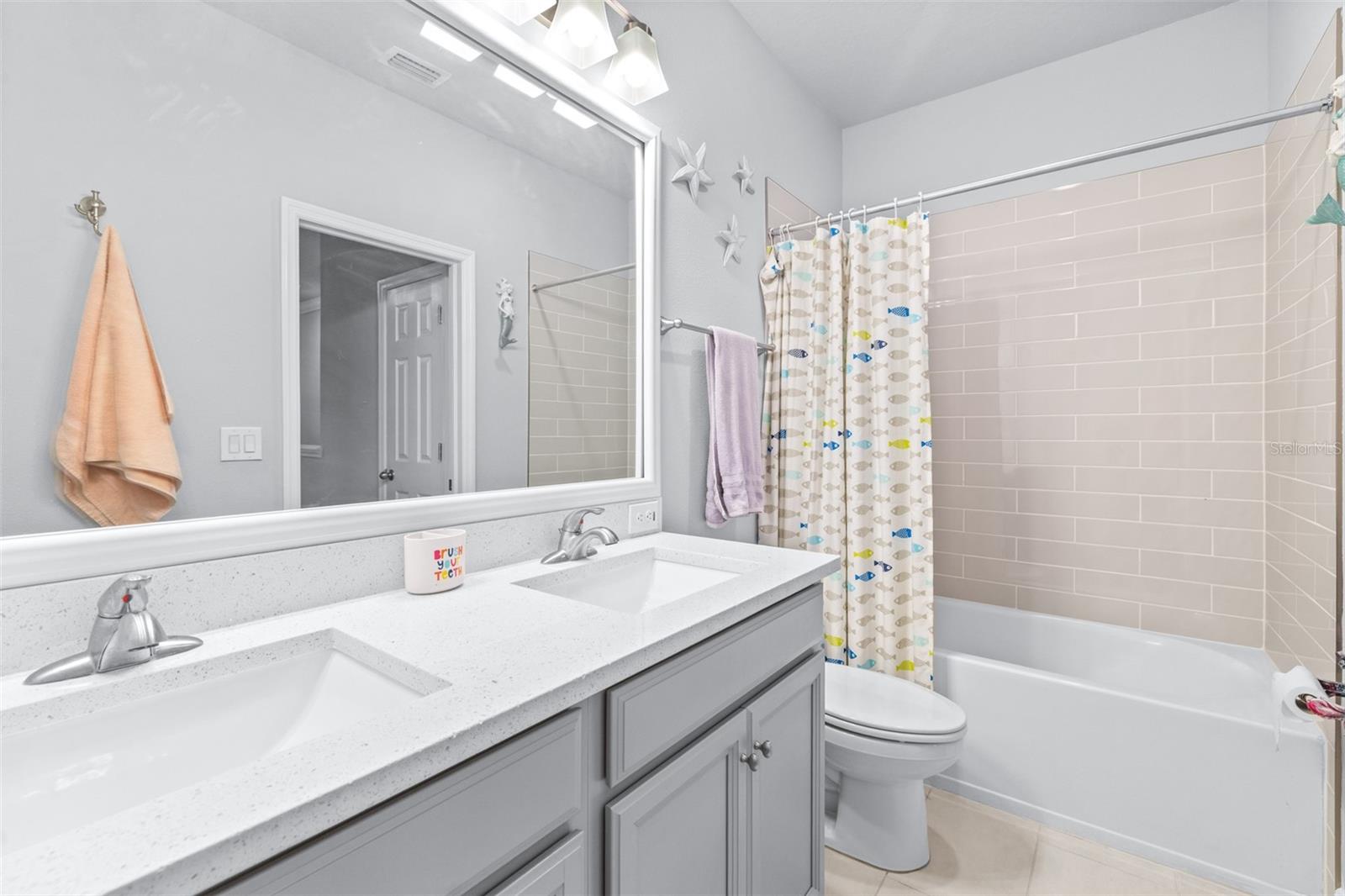 full bath located upstairs has double sinks