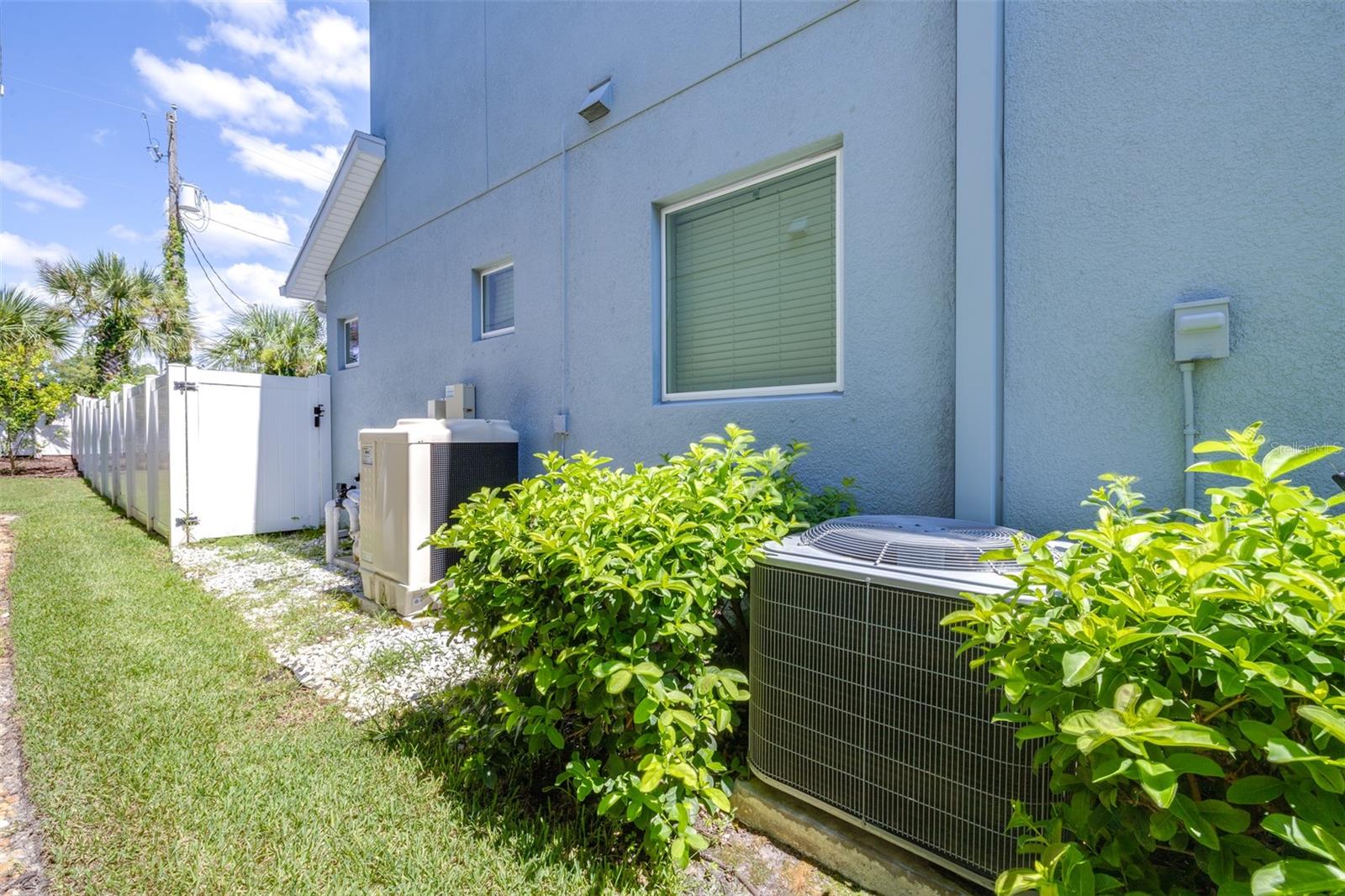 15 seer A/C and pool heater and equipment located on the left side of the home