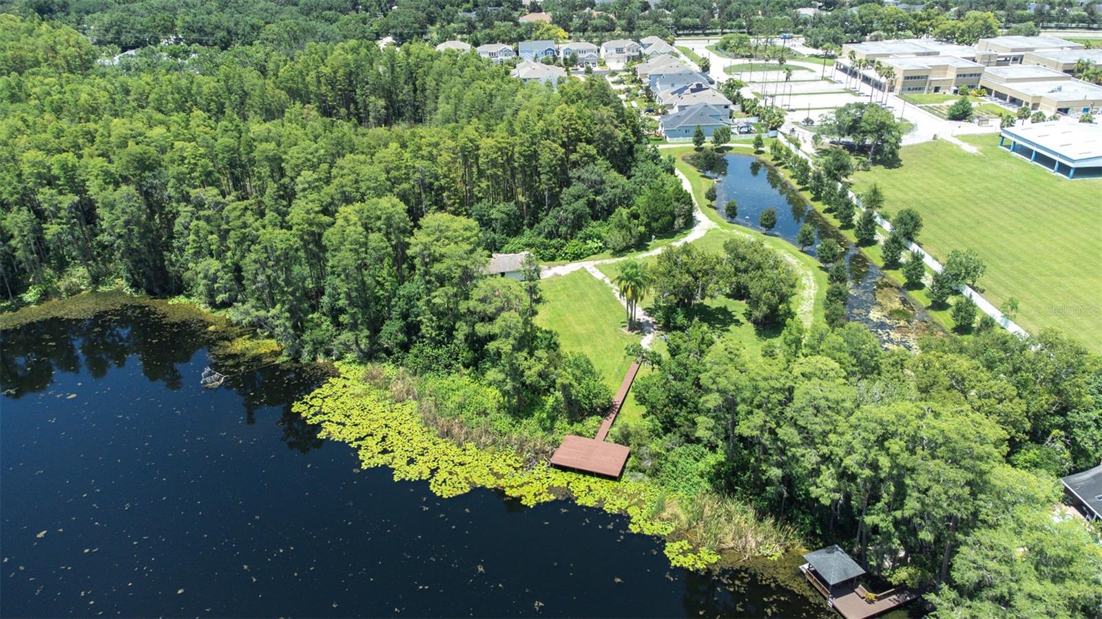 The walking trail takes you to the dock at the entrance to Little Half Moon Lake where you can launch your own kayak year round
