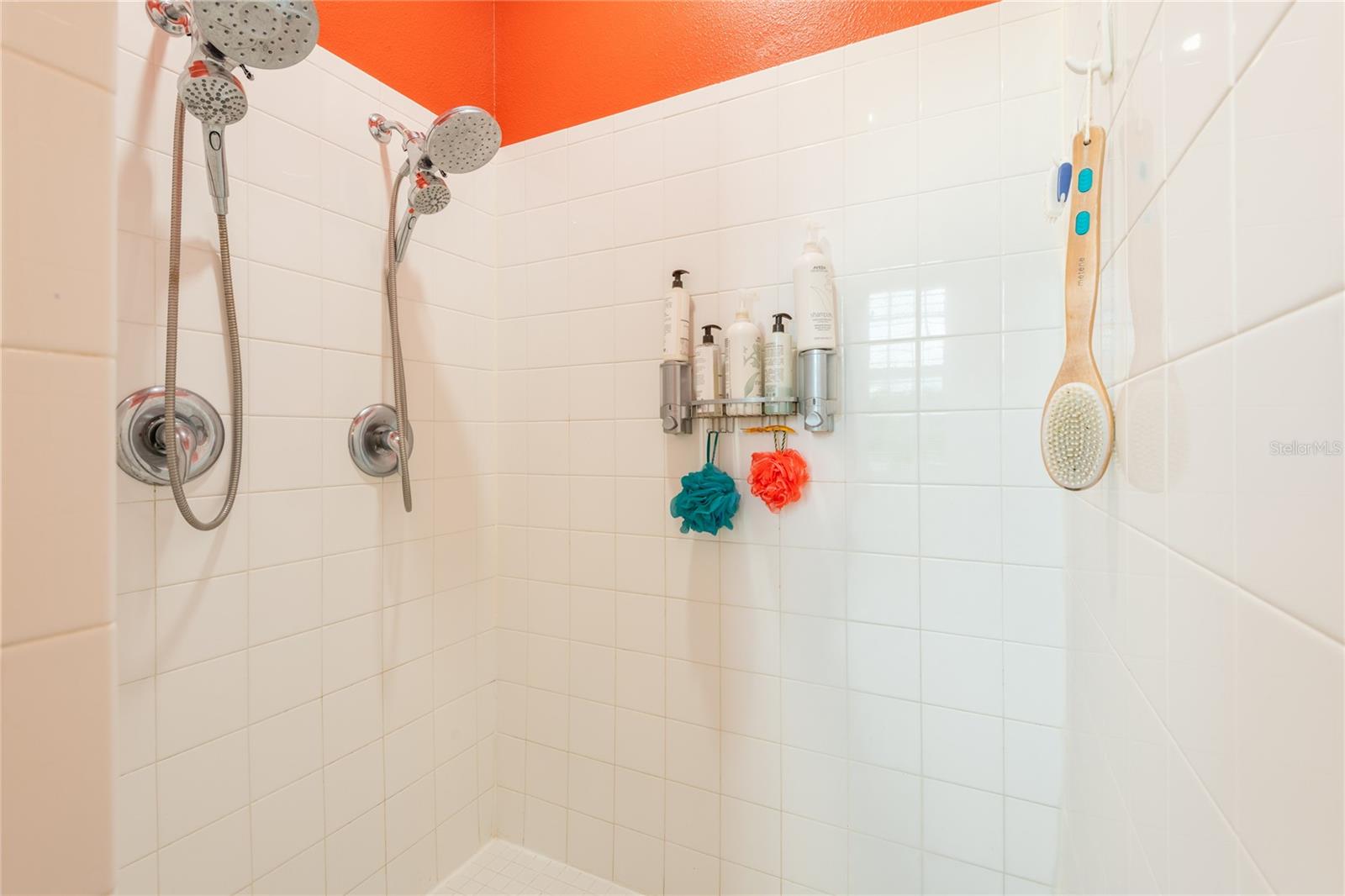 Master shower with dual shower heads.  Easy clean.