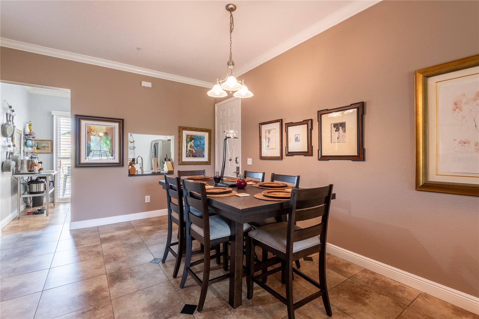 Dining area just off the kitchen with pass thru window.
