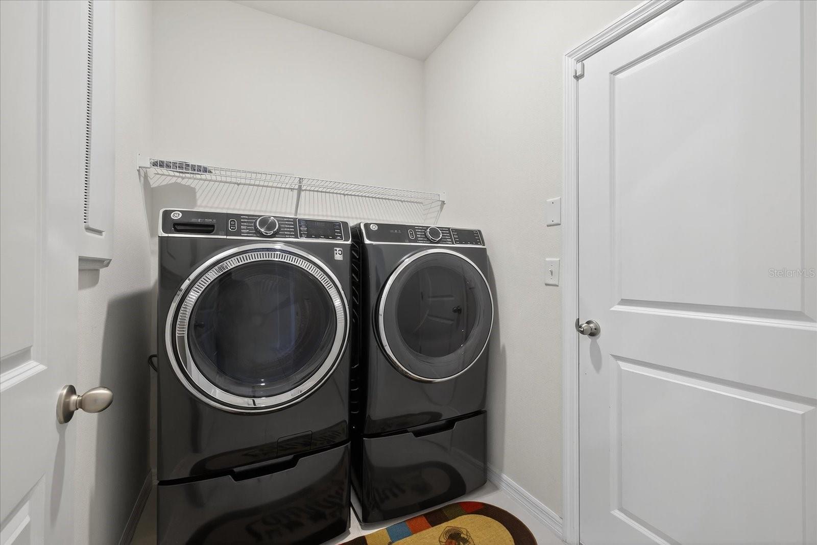 Indoor laundry off garage entrance. Washer/Dryer not included