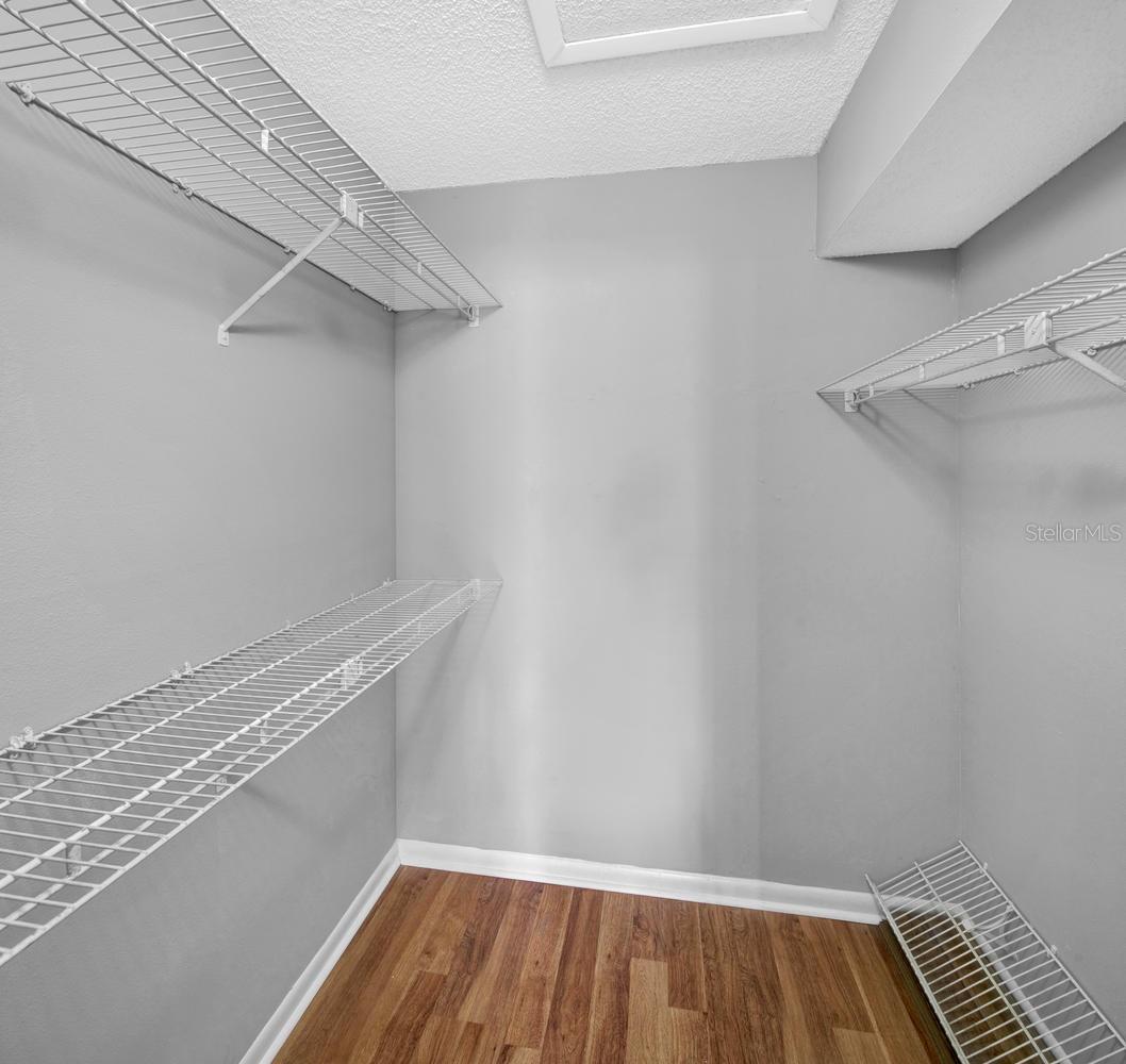 primary bedroom walk in closet
