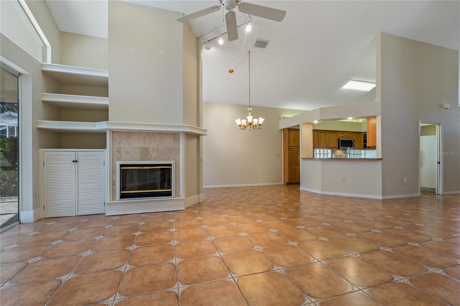 Living Room / Wood Burning Fire Place / Dinette