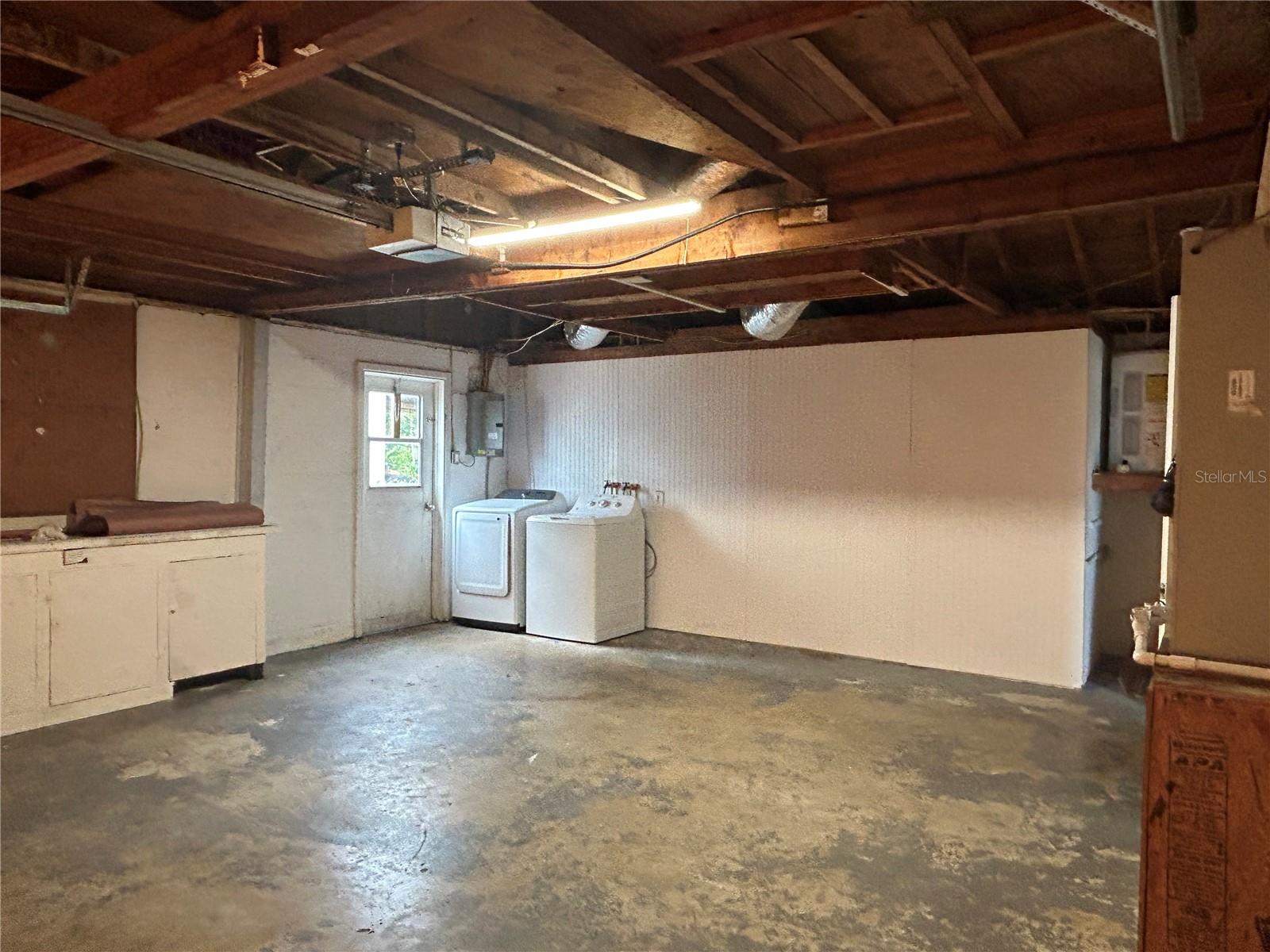 Garage with work area on side