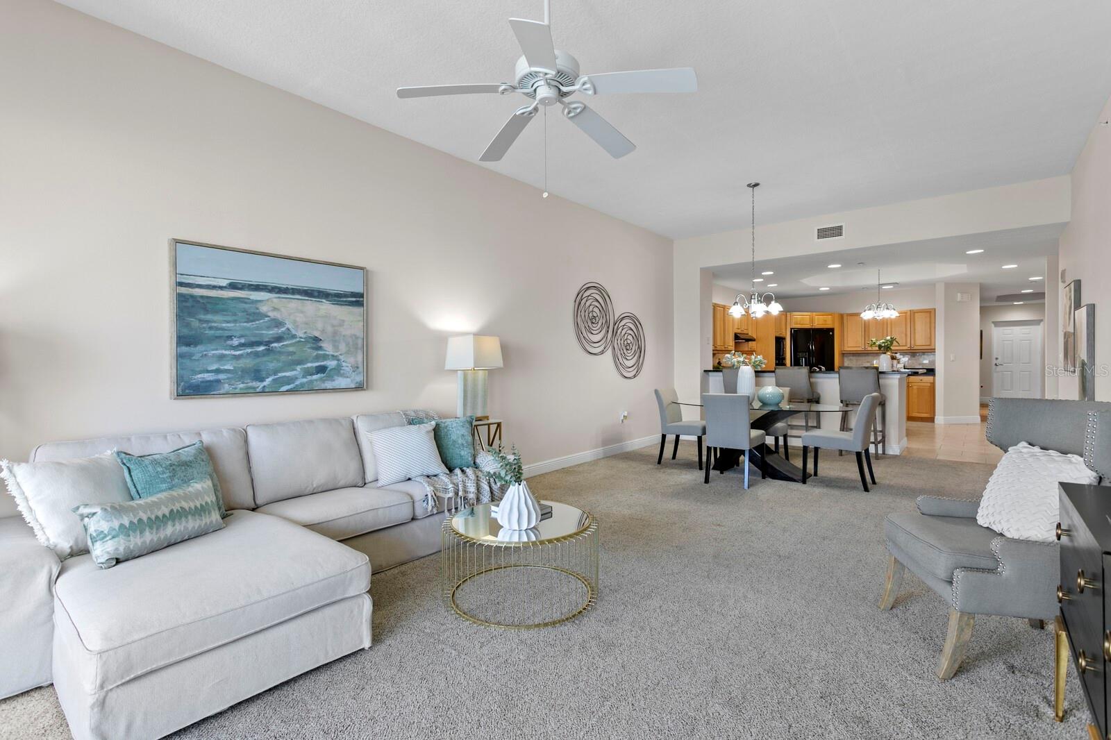 Living room facing dining and kitchen