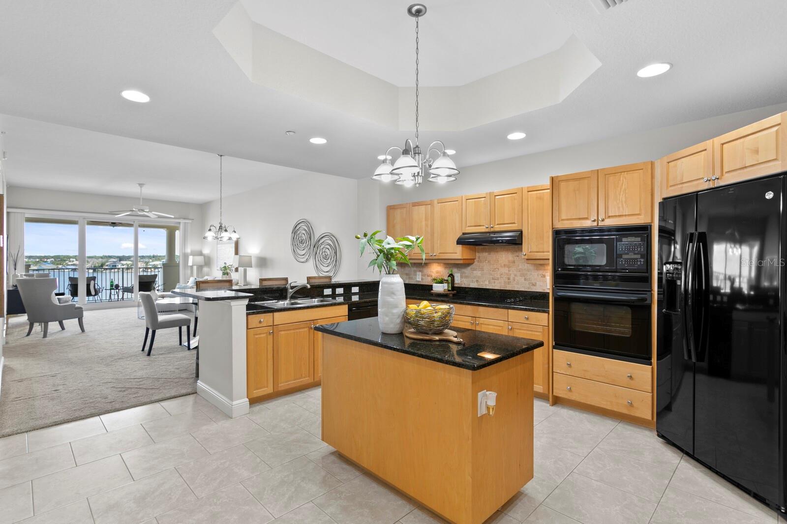 Kitchen from foyer, near the laundry room