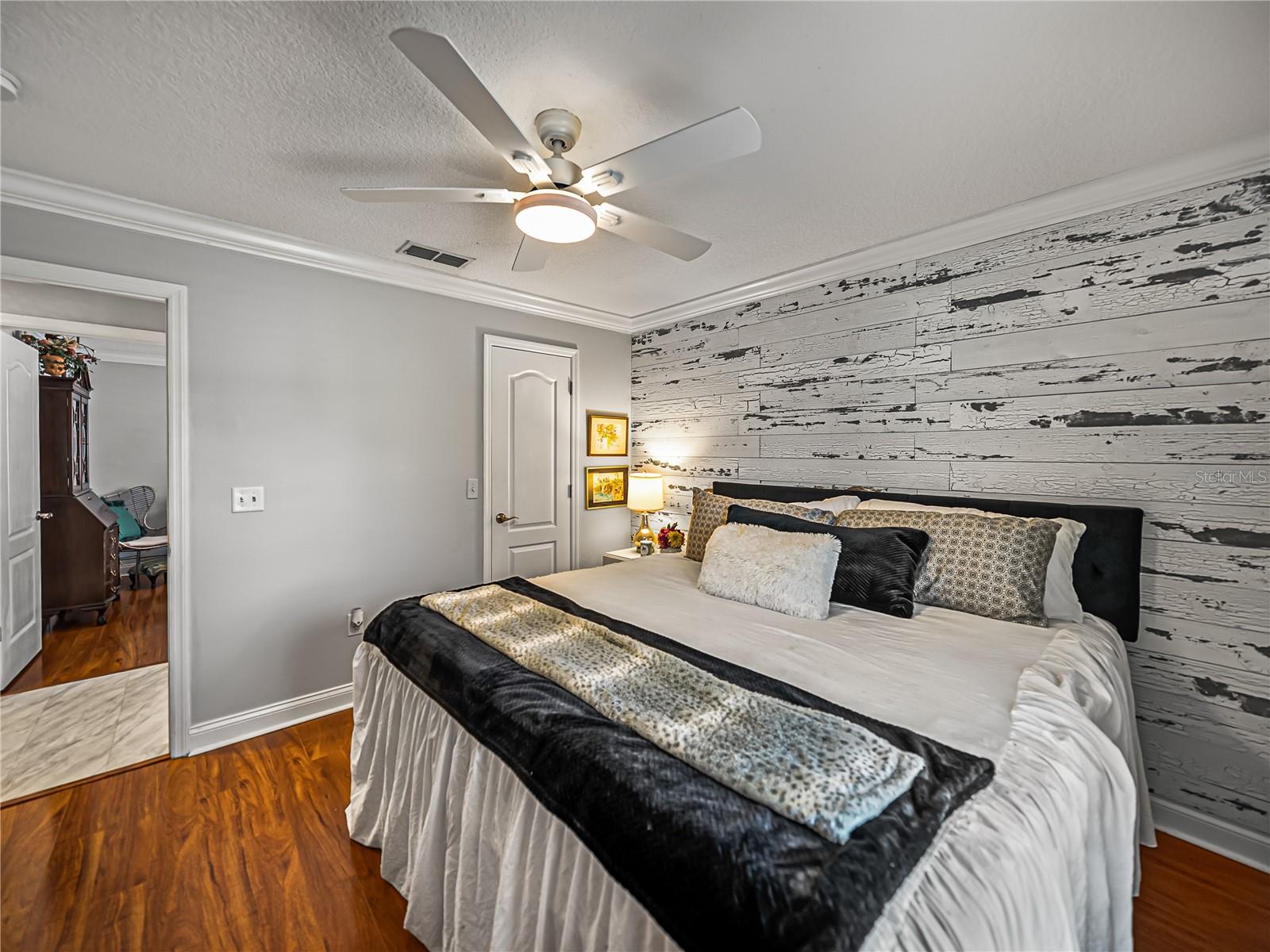 Third Bedroom with Wood Accent Wall