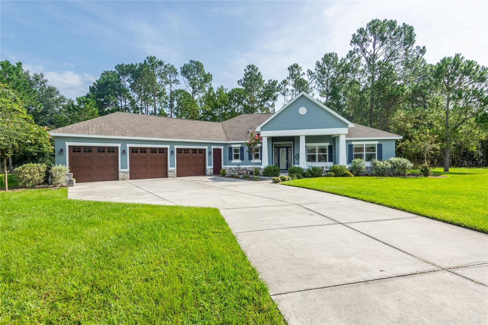 Custom built home on 2.6 acres in the peaceful gated community of Westwood Estates.