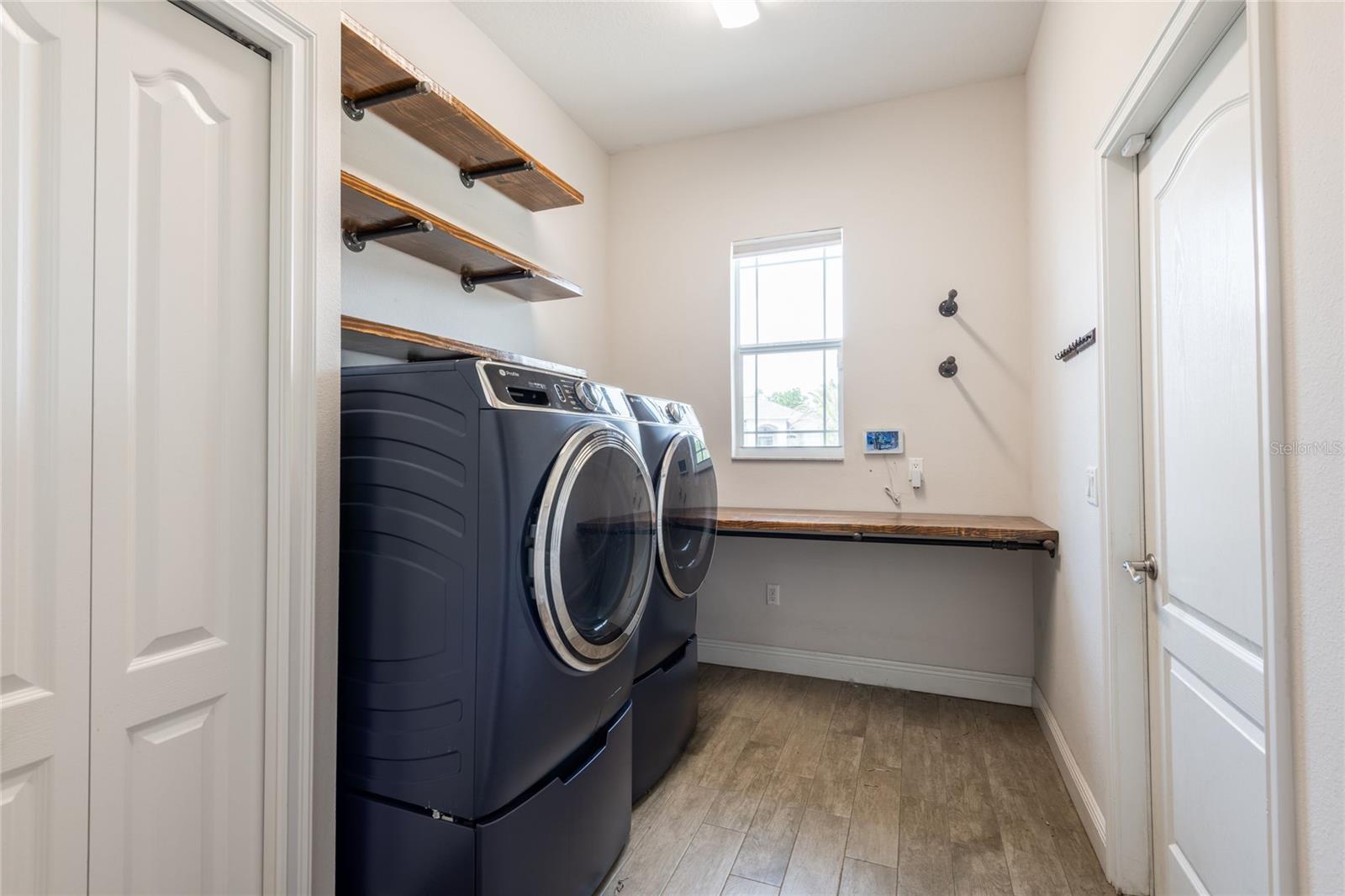 Laundry room with lots of storage.