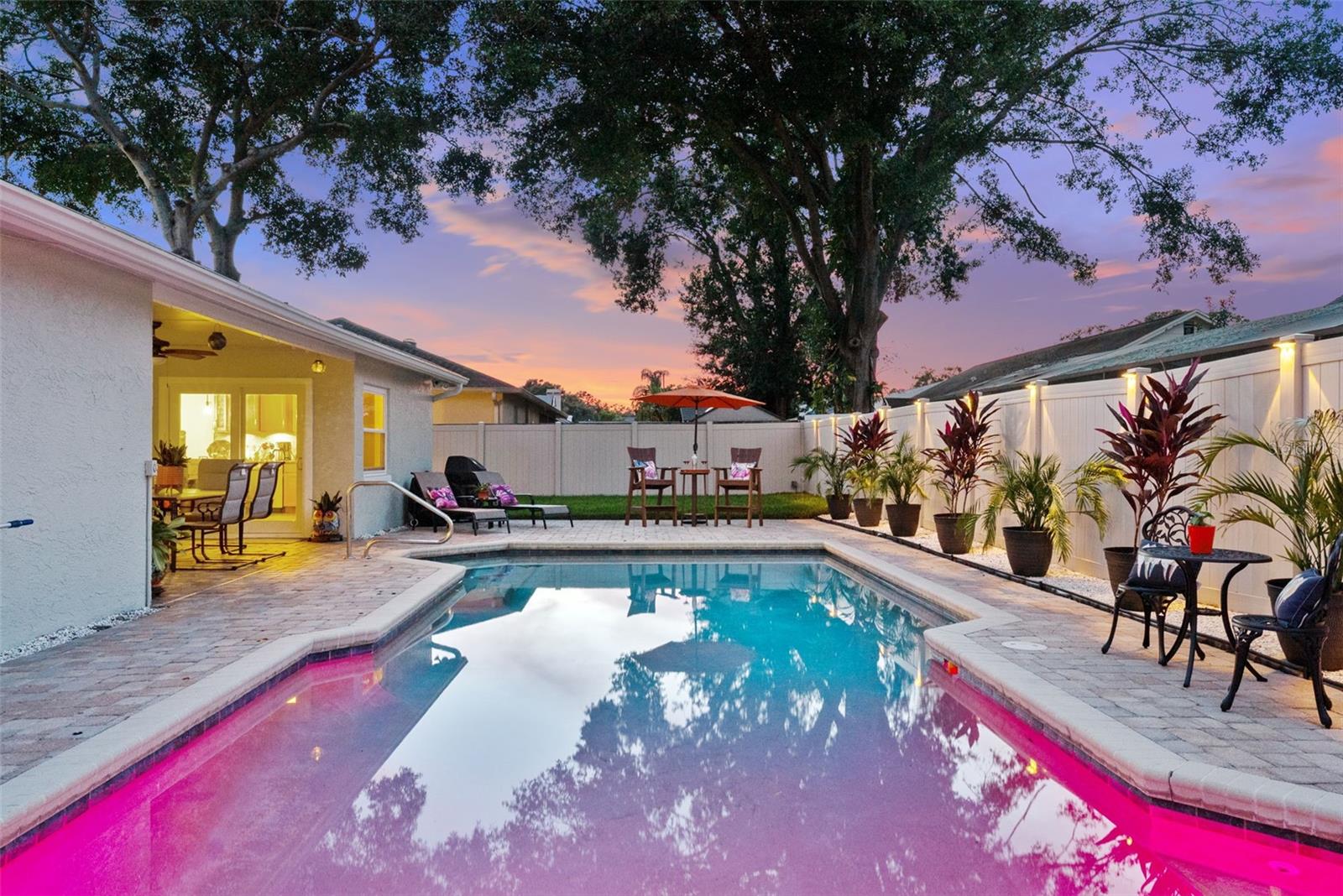 Exterior pool , patio, lawn facing east side of home