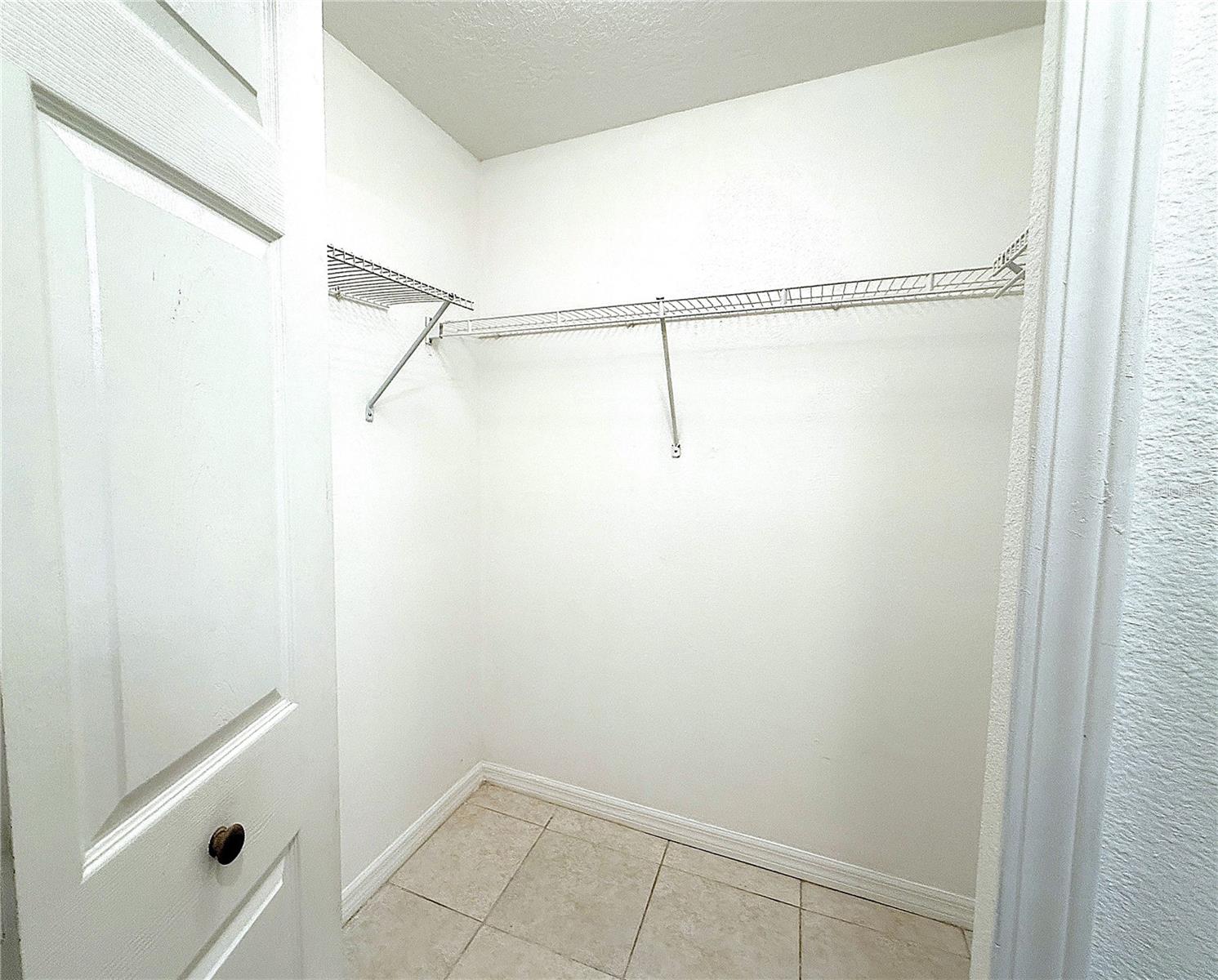 Primary walk-in closet