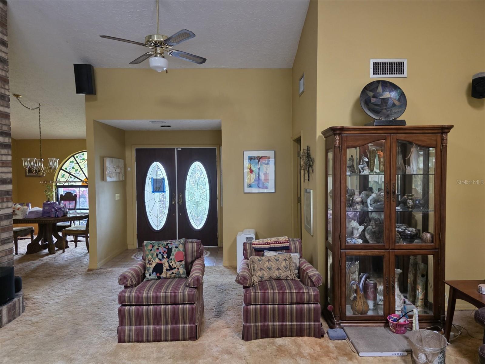 Entrance / Foyer with view of Formal Dinning Room