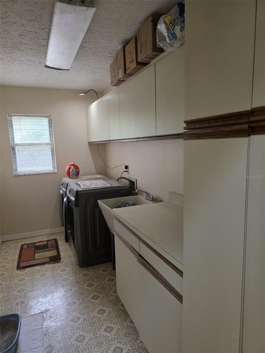 Inside laundry room with Washer & Dryer