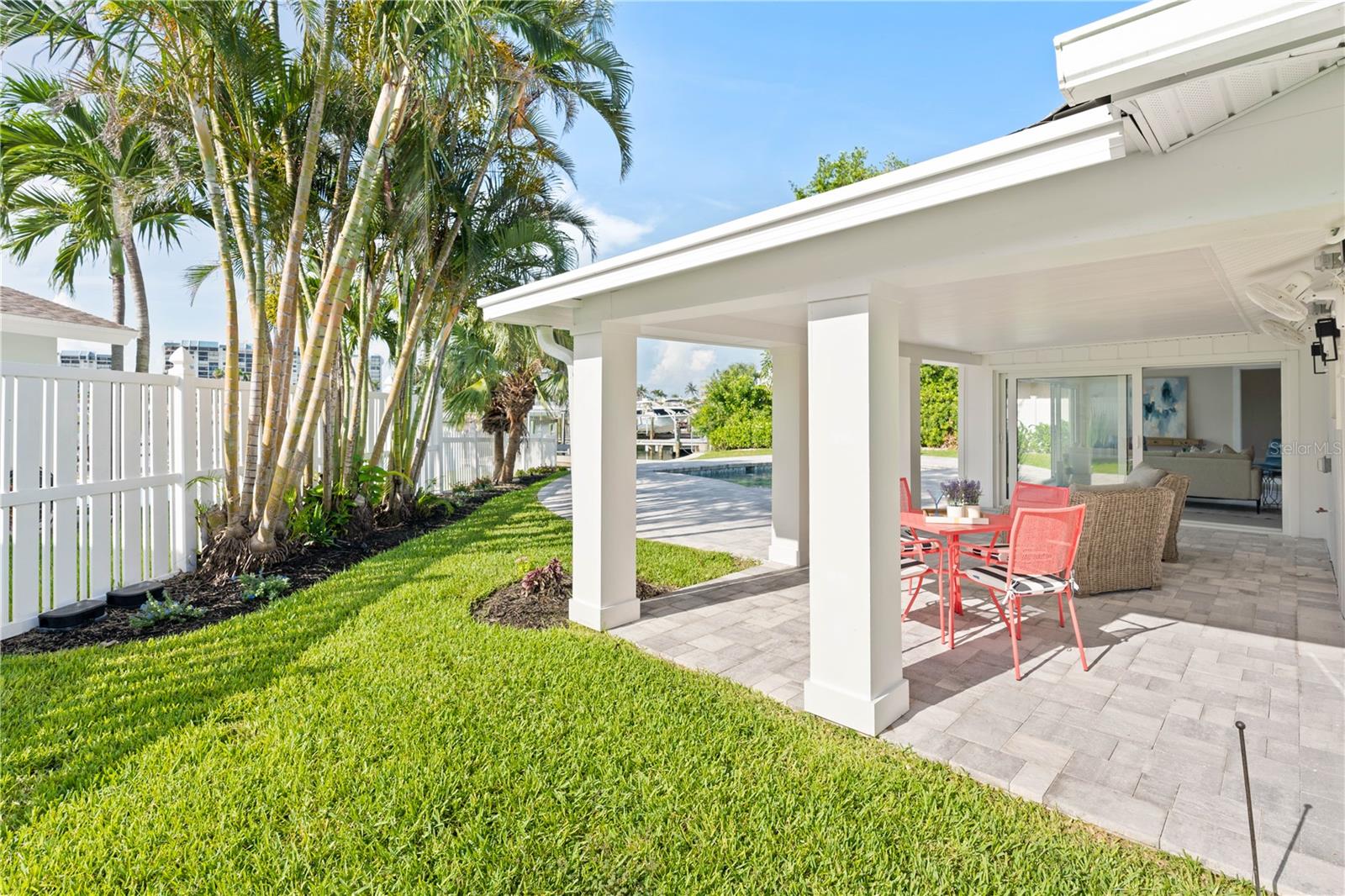 Cozy retreat for morning coffee and dolphin watching.  Seamless transitions between indoor and outdoor entertaining spaces.
