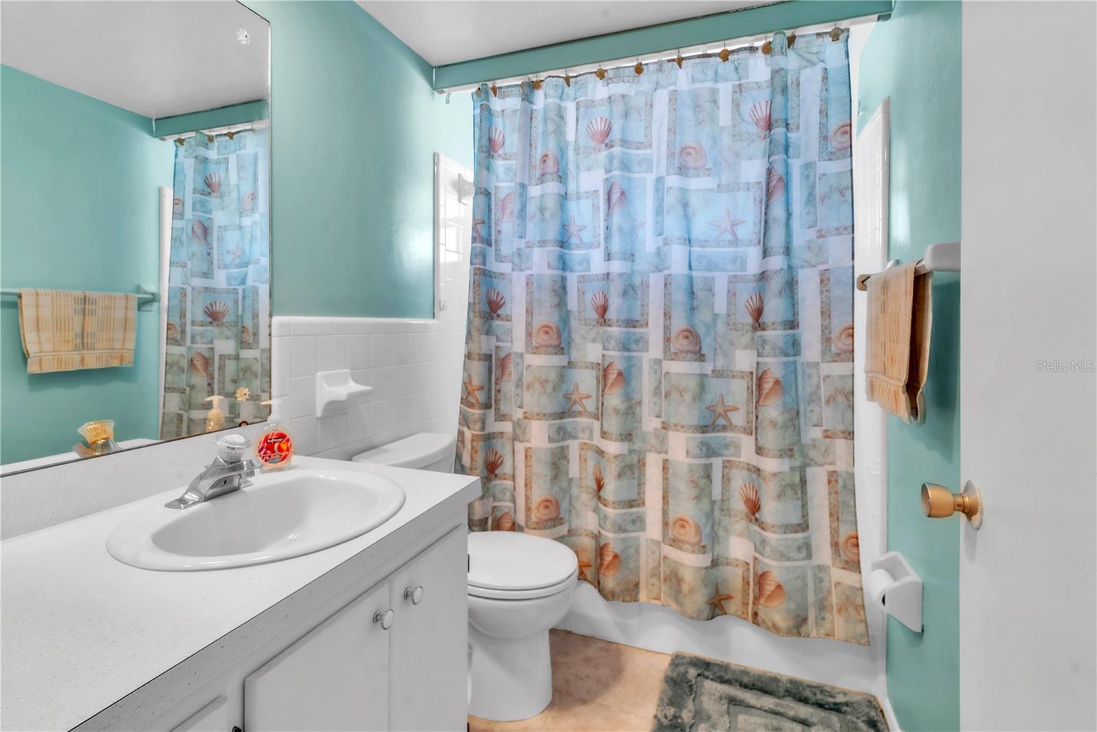 guest bathroom with tub