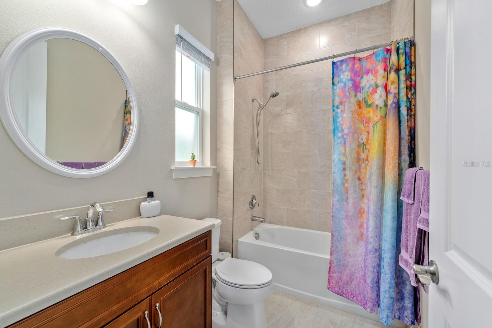 This full bathroom is the ensuite for Bedroom 1, it's inside the Bedroom.