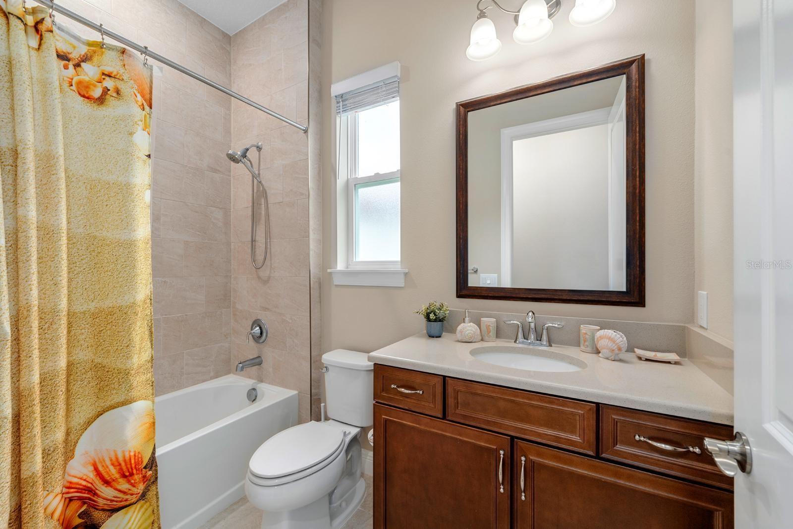 This full bathroom is for Bedroom 4 or could be used as a guest bathroom too. Two full bathrooms are accessible for guests, without being in a bedroom.