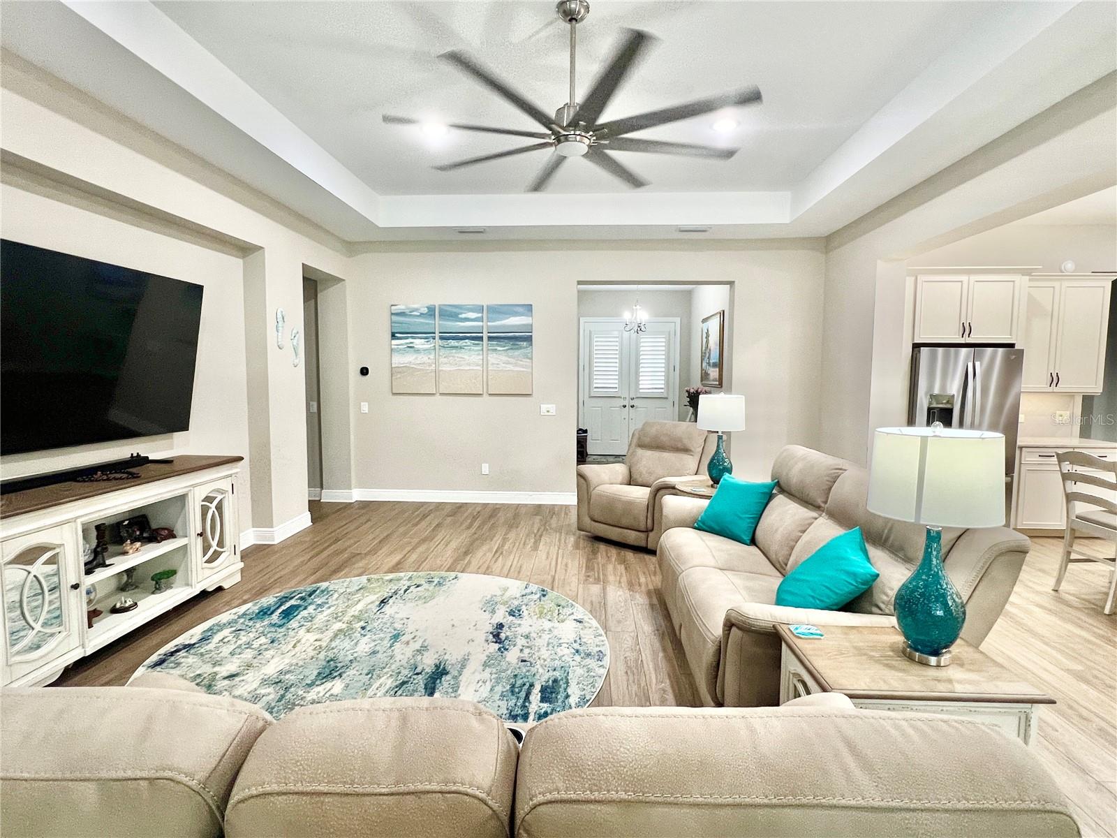 Notice the large tray ceiling that houses the enormous fan.