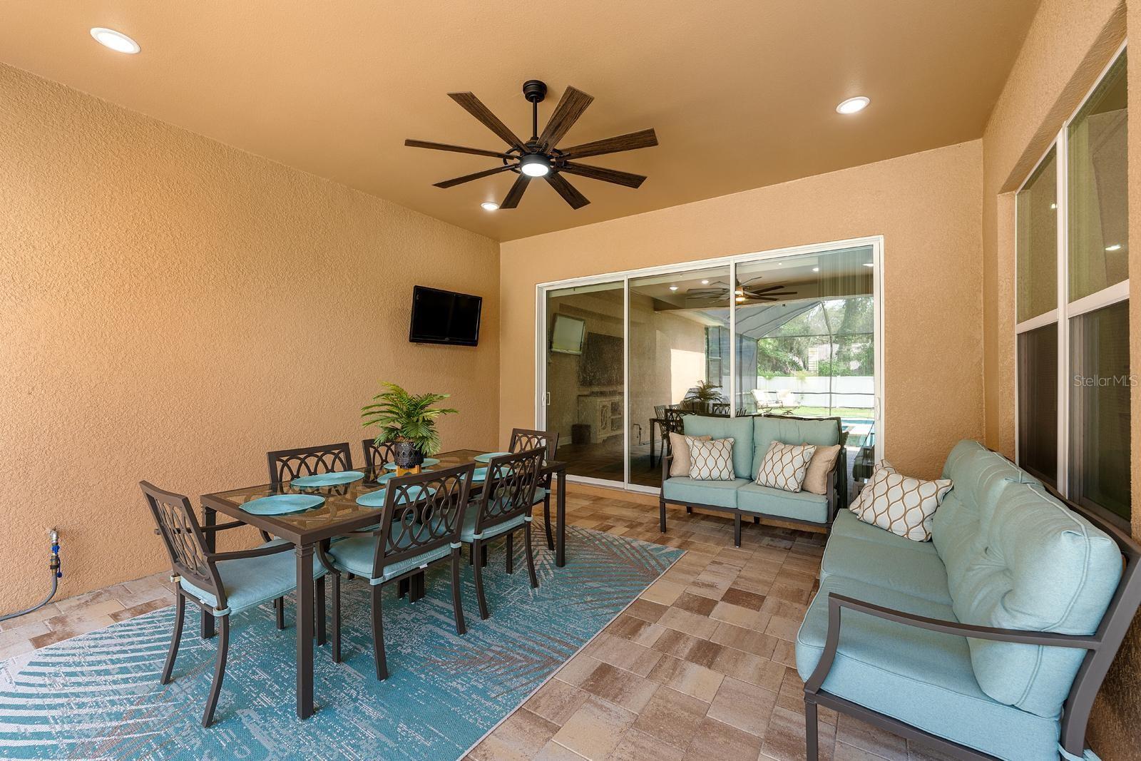 There's a lighted ceiling fan and several recessed lights for extra brightness.
