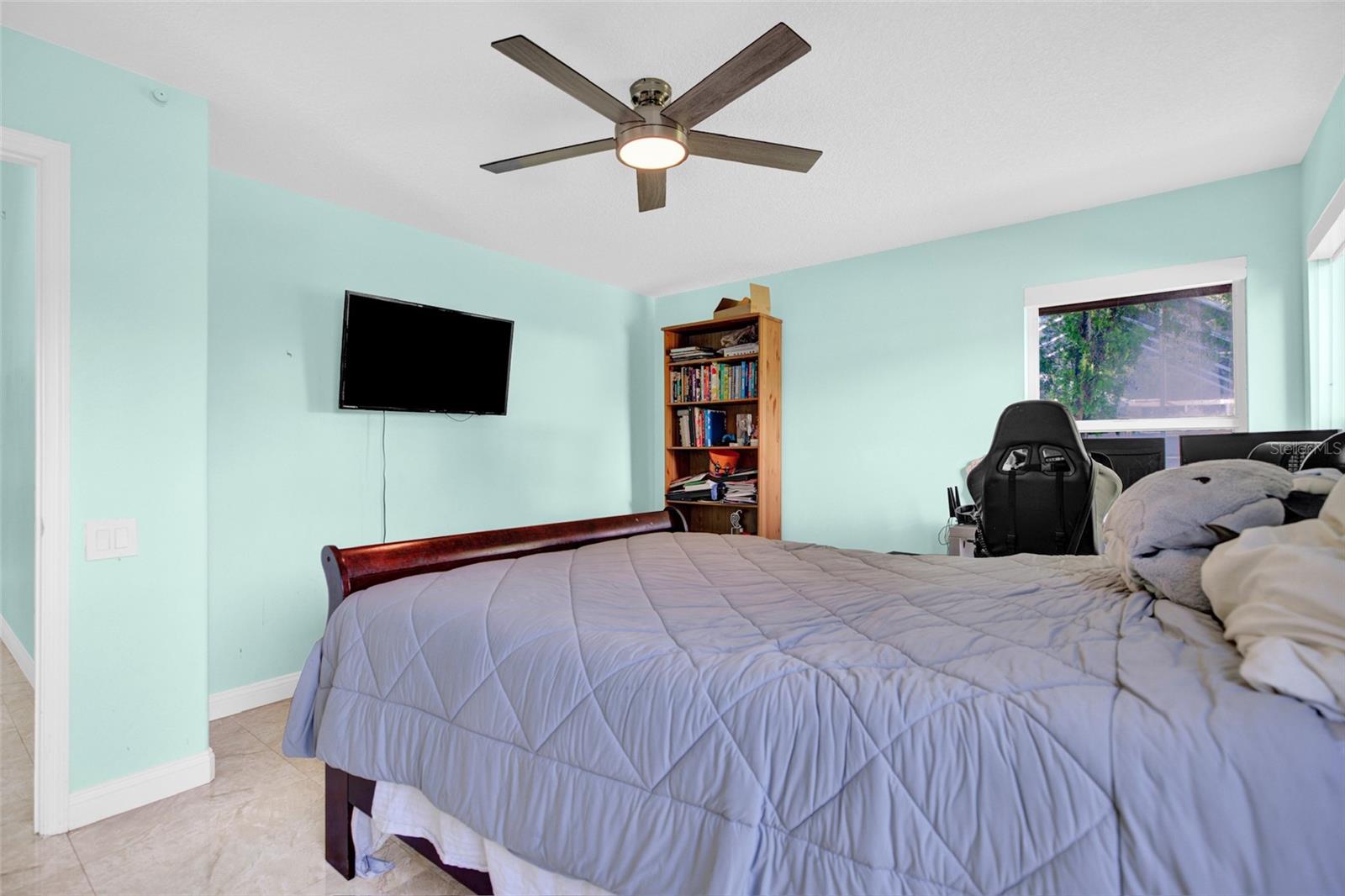 Bedroom 1 with private access to the pool bath