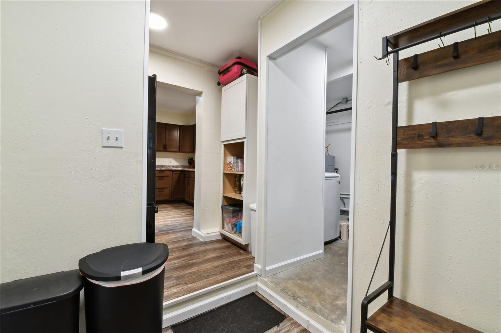 Mudroom outside of kitchen and laundry rooms
