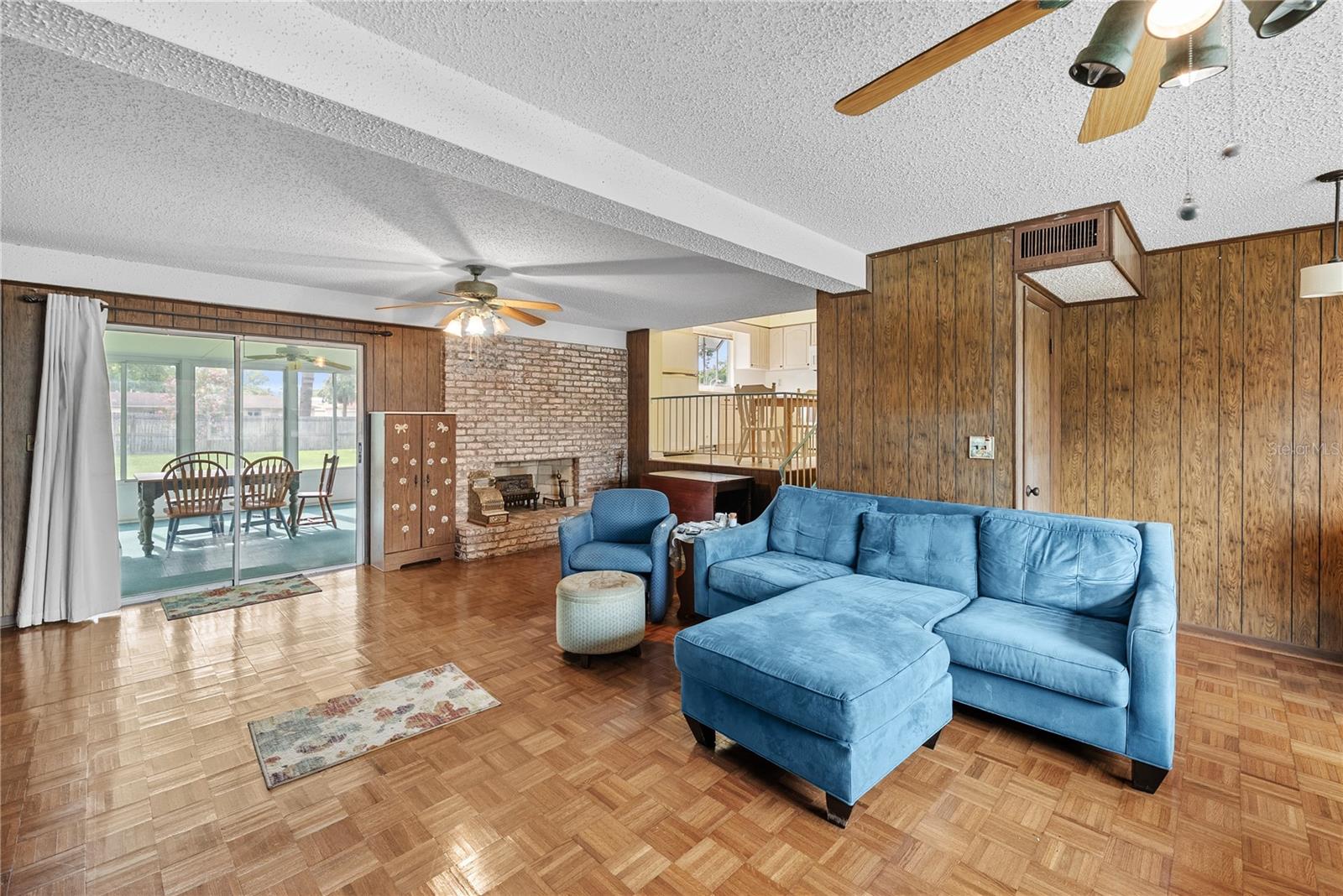 Family Room w/Woodburning Fireplace