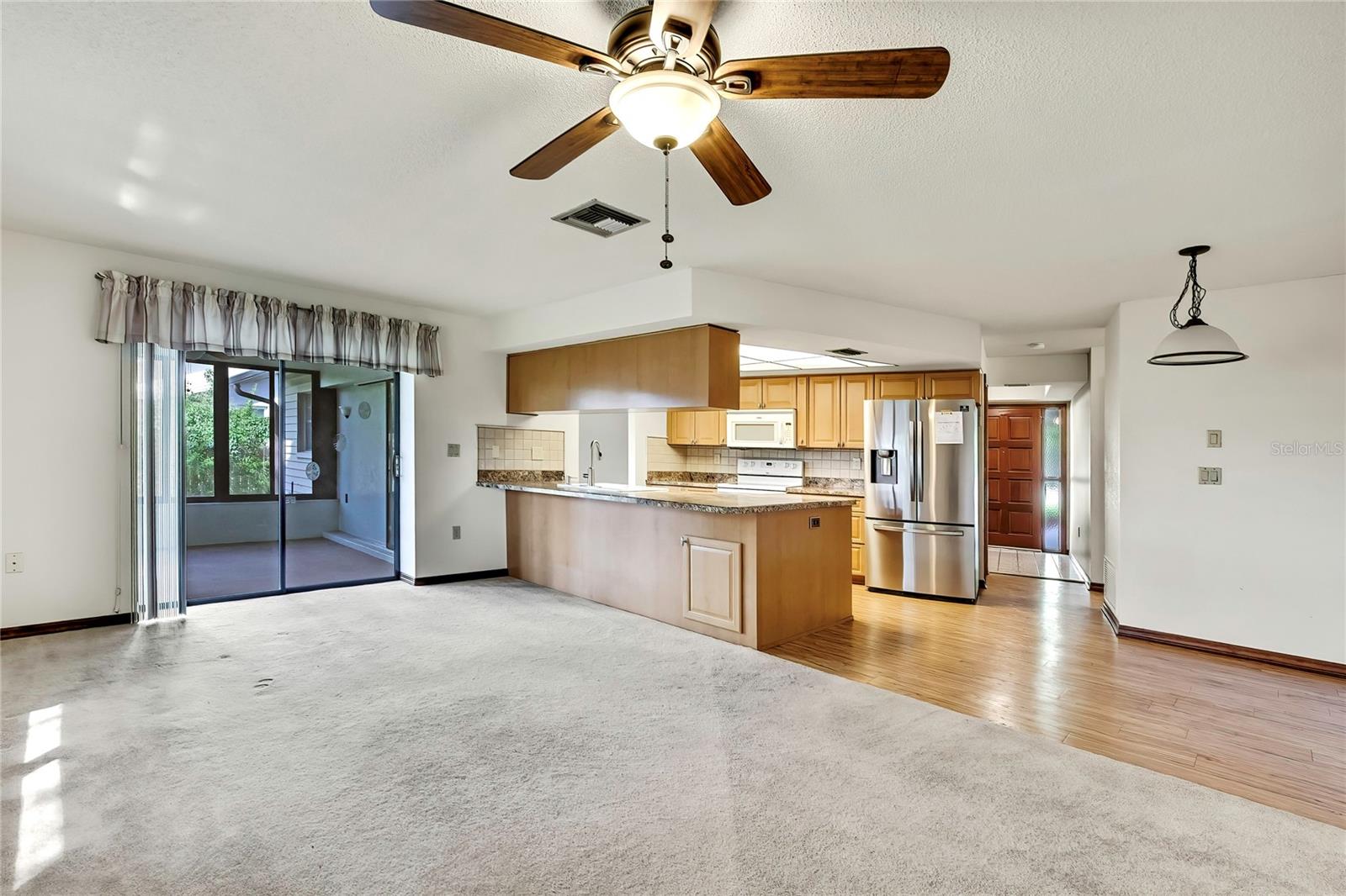 Family Room open to sunroom