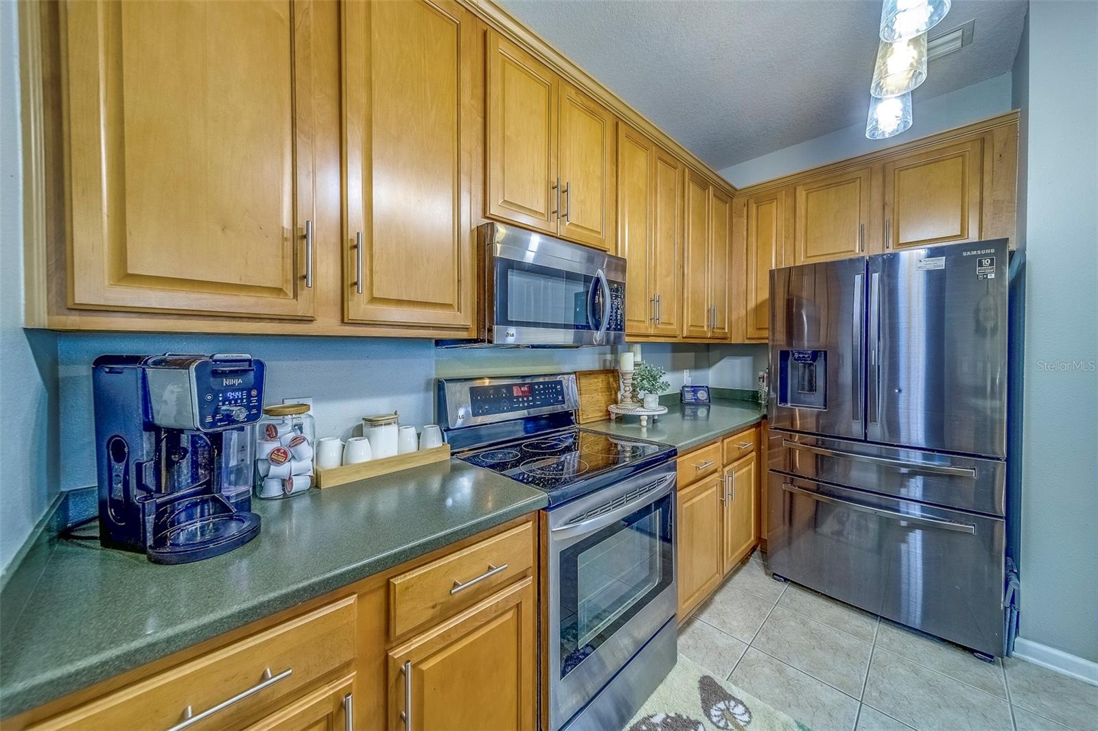 Corian Countertops and Wood Cabinetry