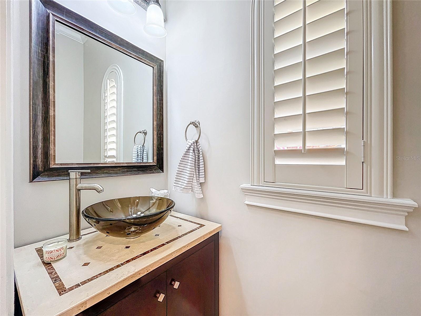 Redesigned half-bathroom on main floor.