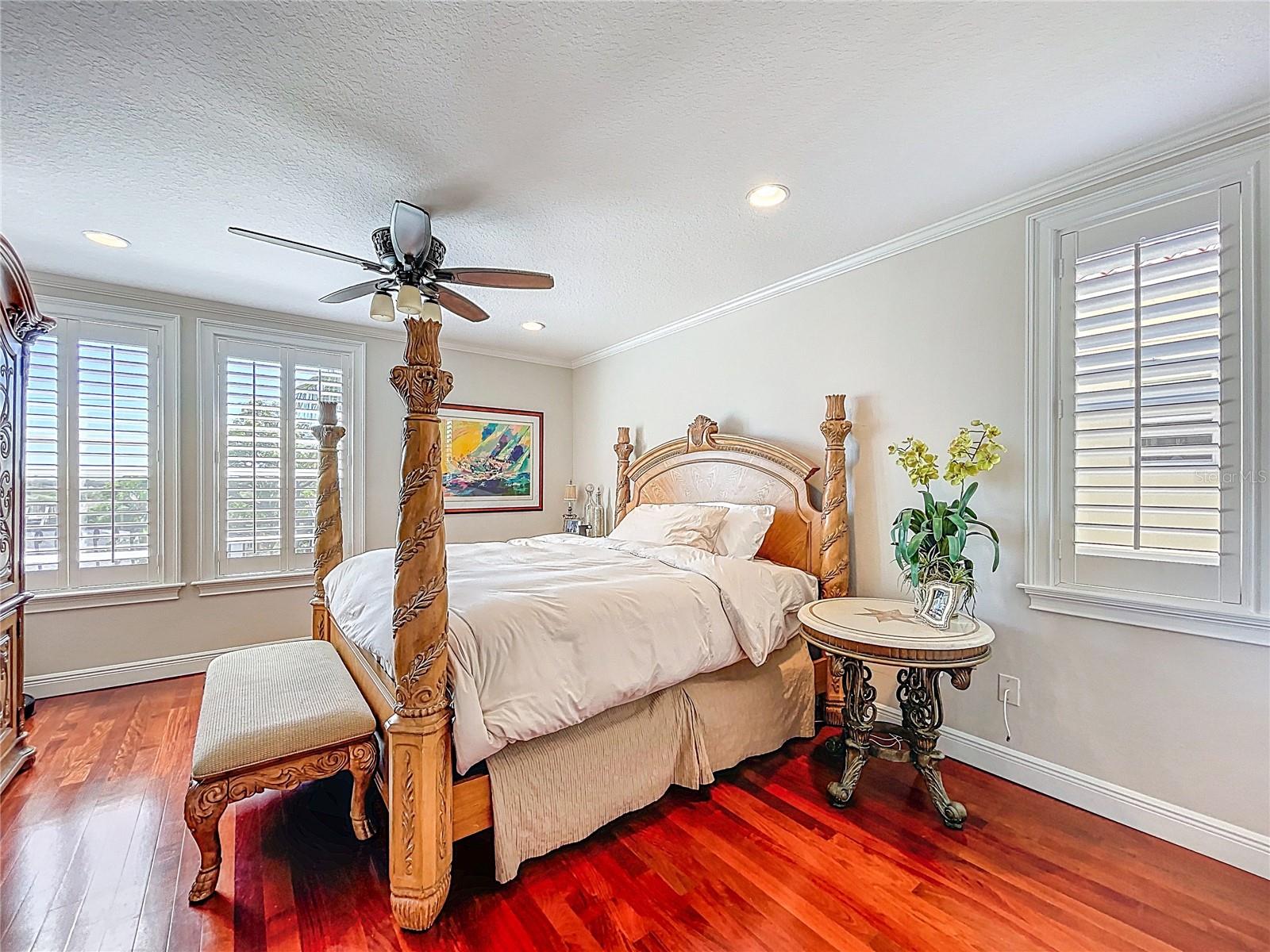Primary bedroom is a private retreat.