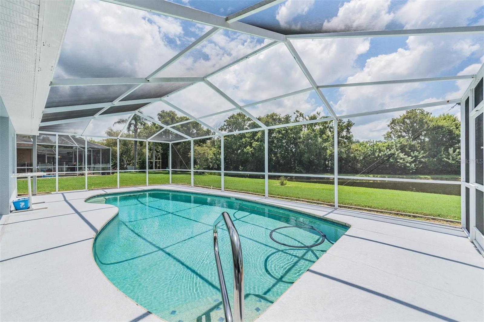 Inviting pool with plenty of room for patio furniture