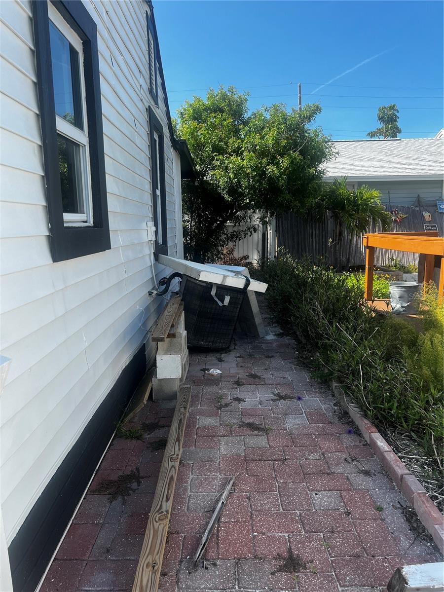 Side of home-pavers from the road all the way back