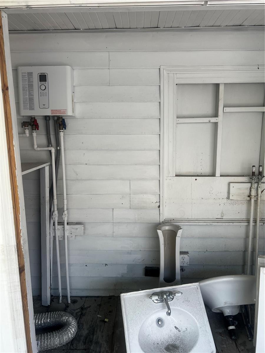 Rear deck, tankless h/w heater-unknown condition after Helene
