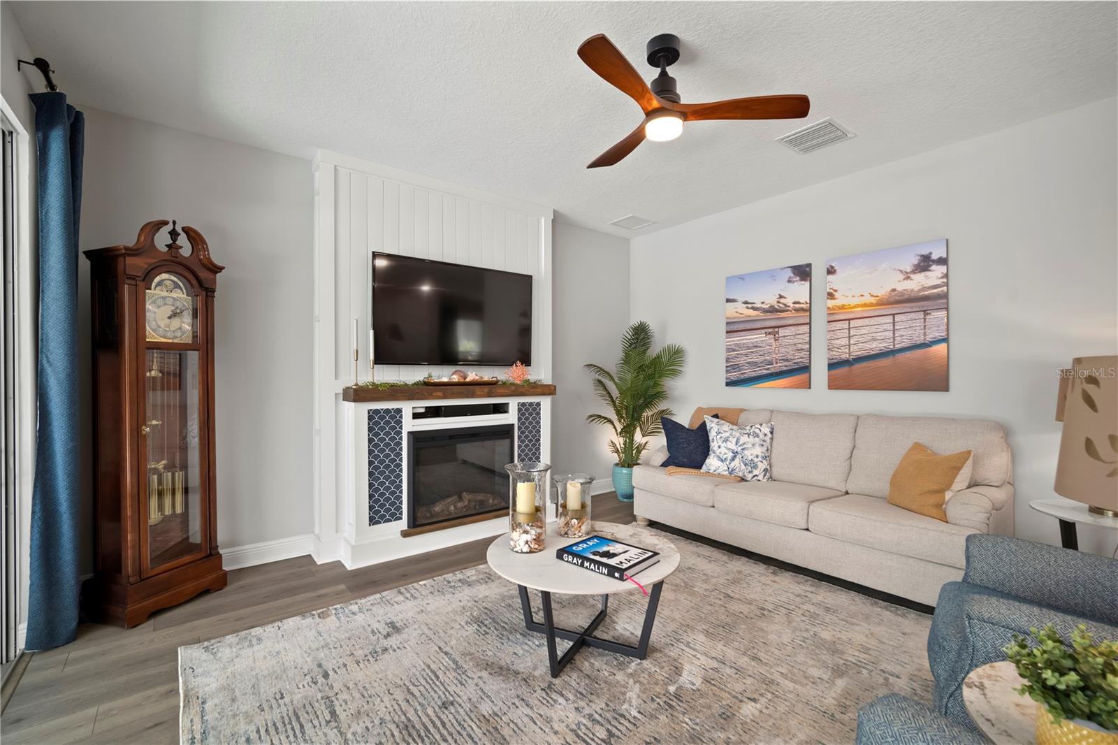 Living Room overlooks pool and lanai