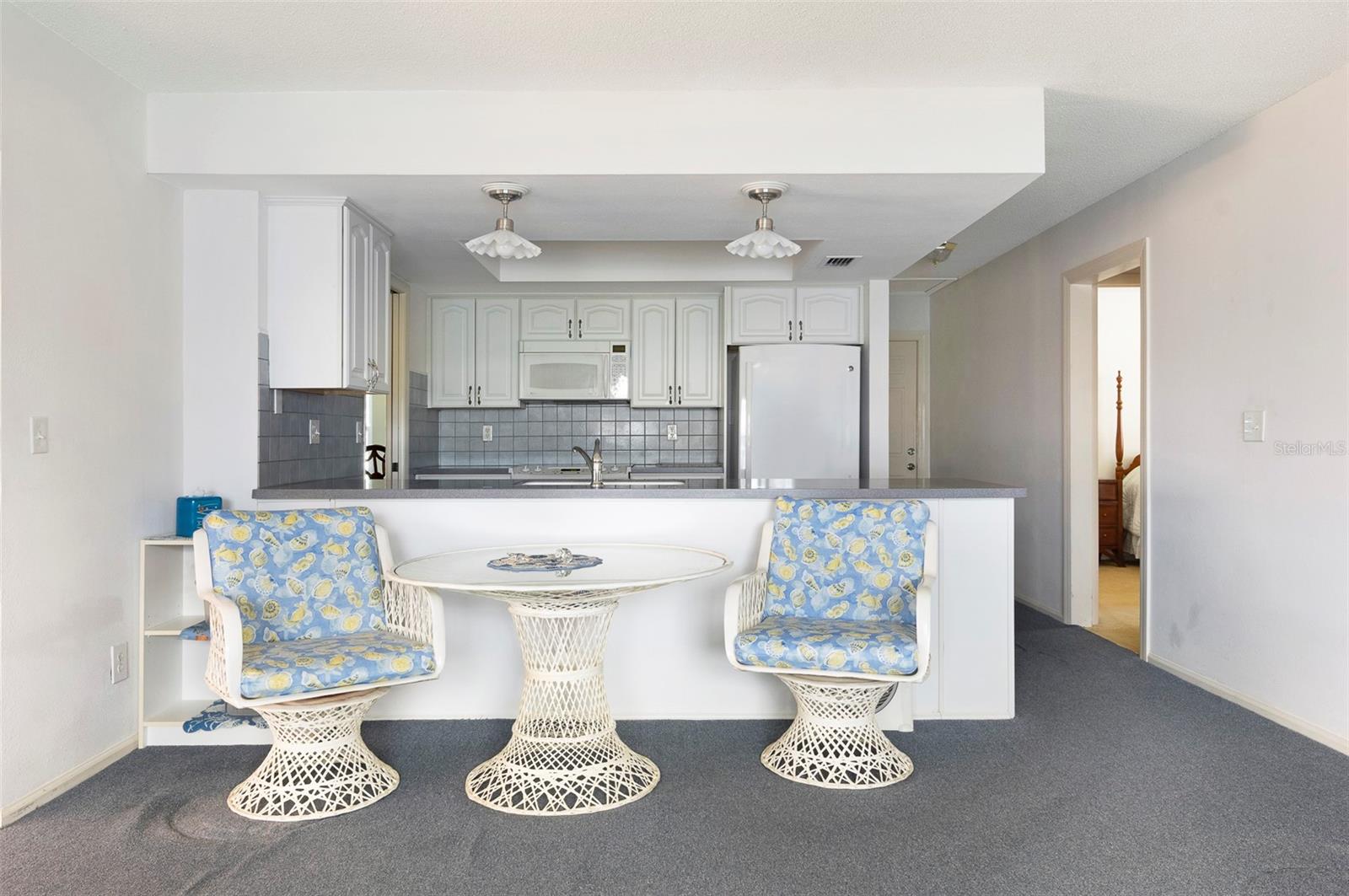 Another view of the kitchen opens to the family room area