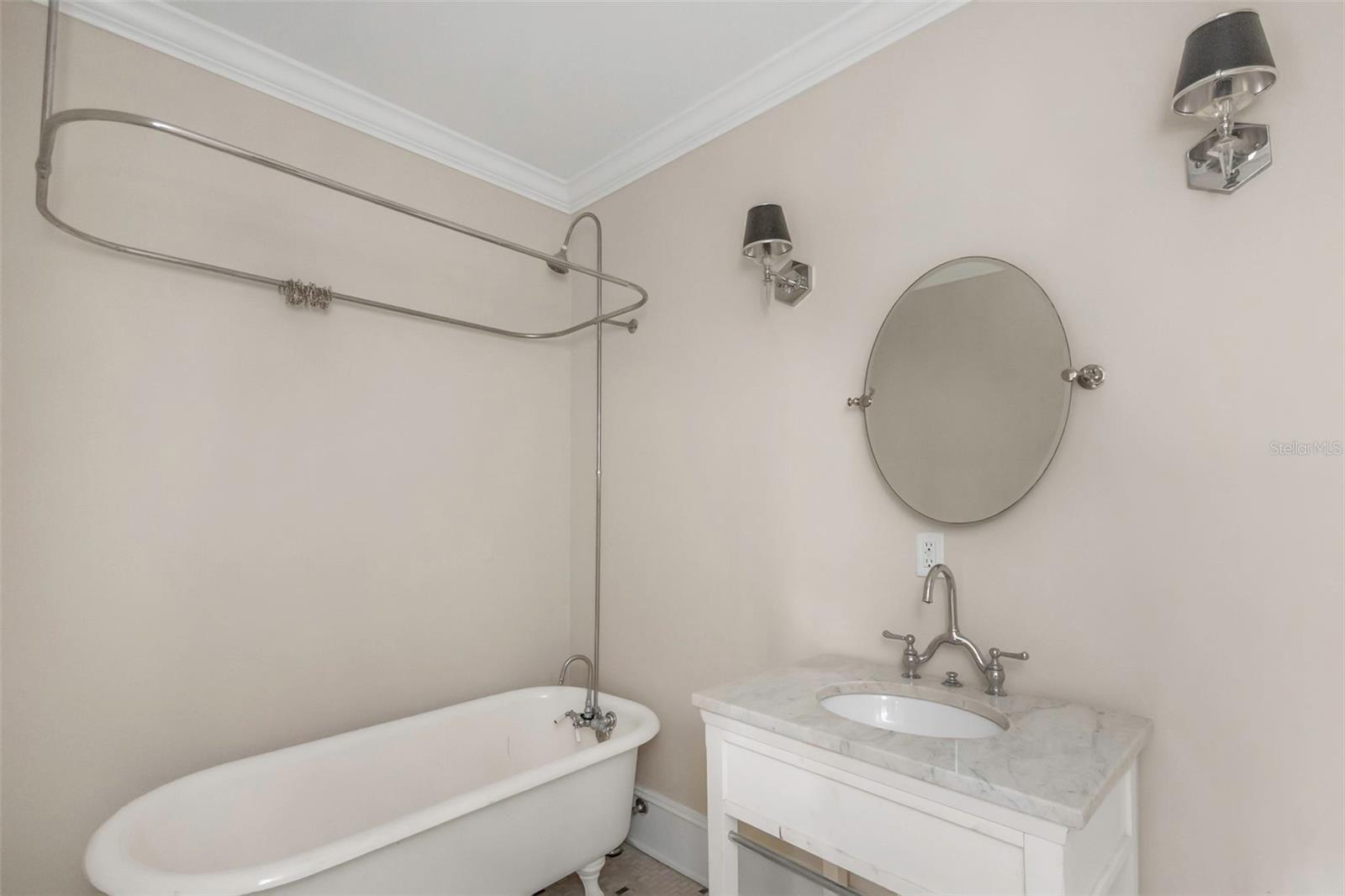 En suite full bath for downstairs bedroom