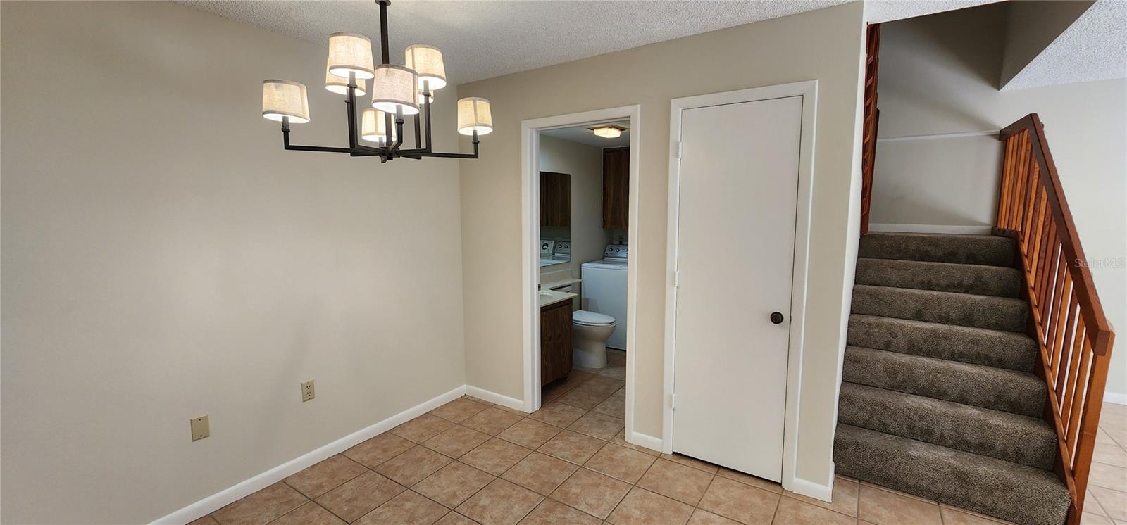 Dining room, laundry and half bath