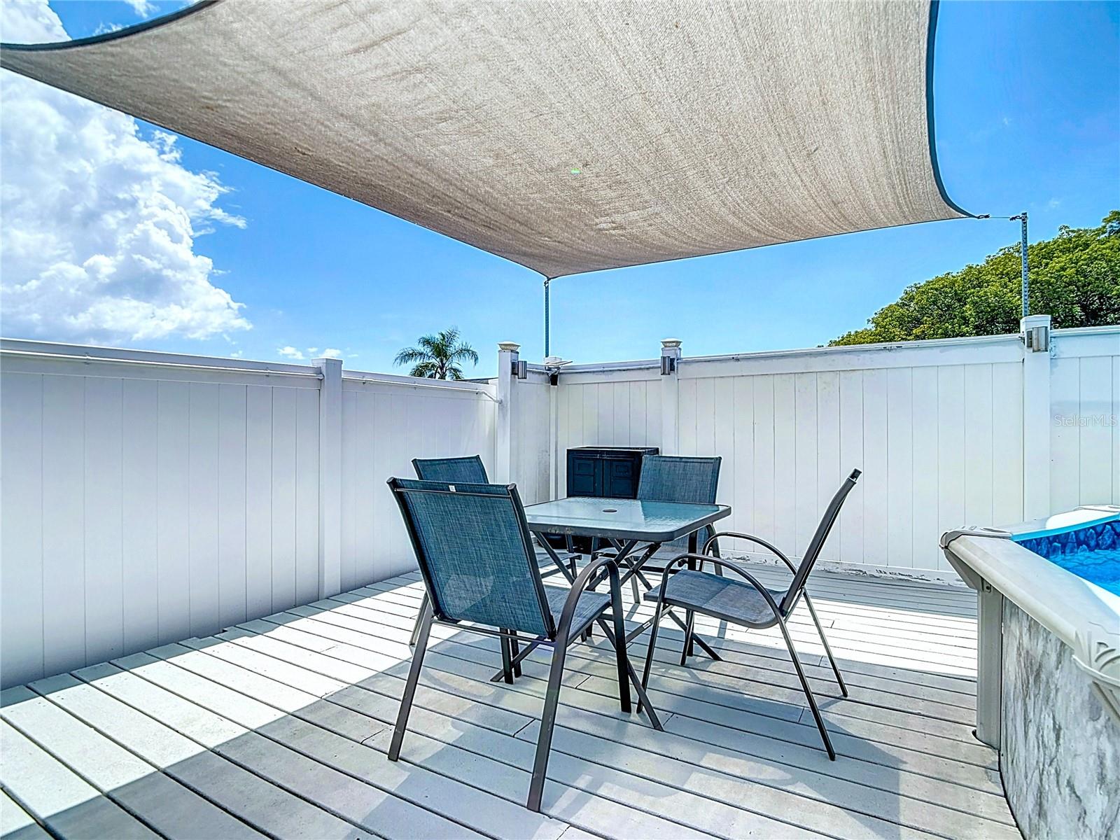Wrap around deck, pool side.