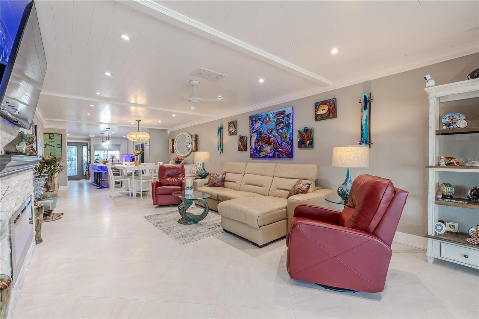 A sleek Minka ceiling fan with remote control offers added comfort and airflow.