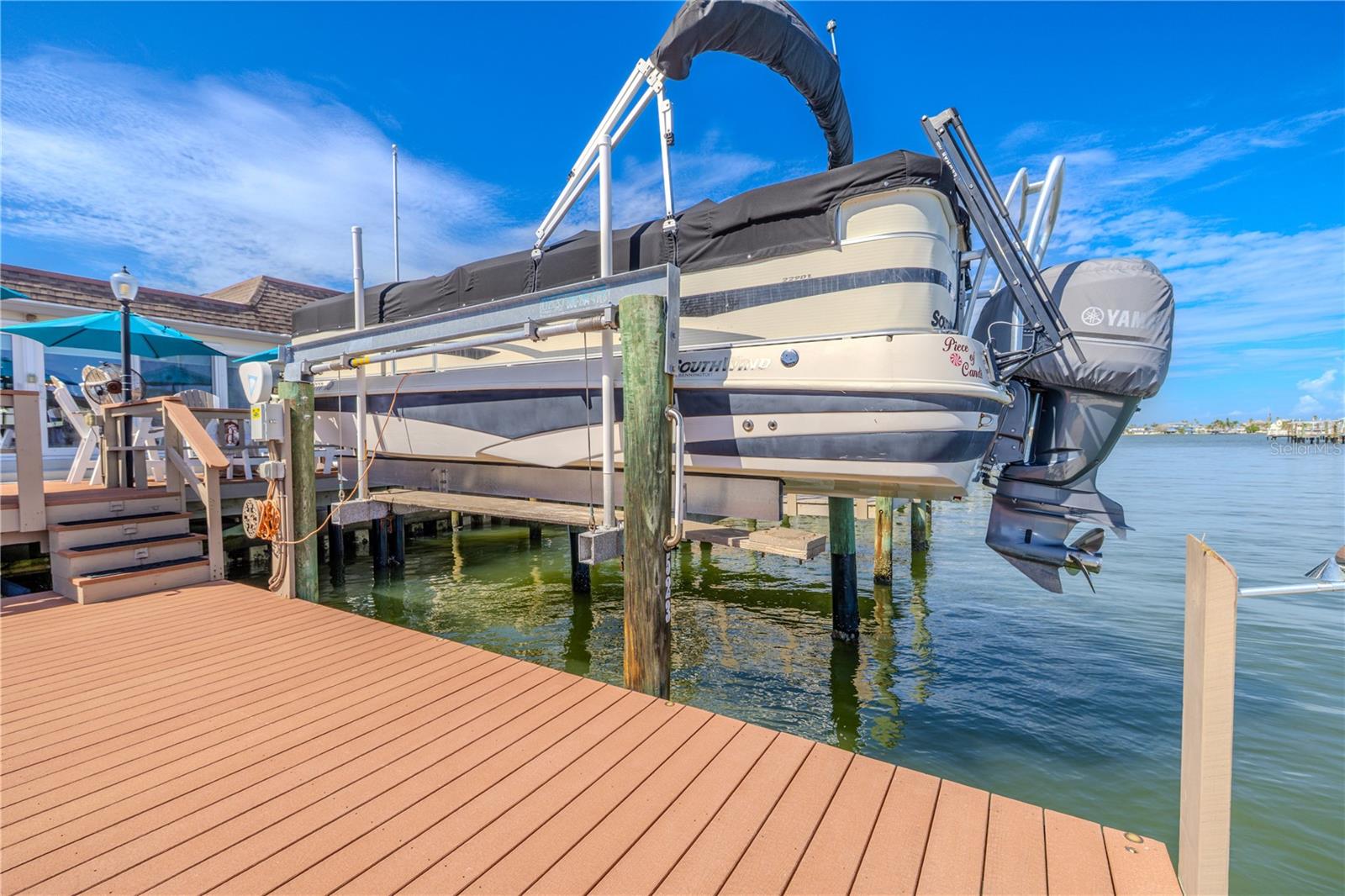 A 6,000 lb Deco boat lift with remote control makes launching a breeze