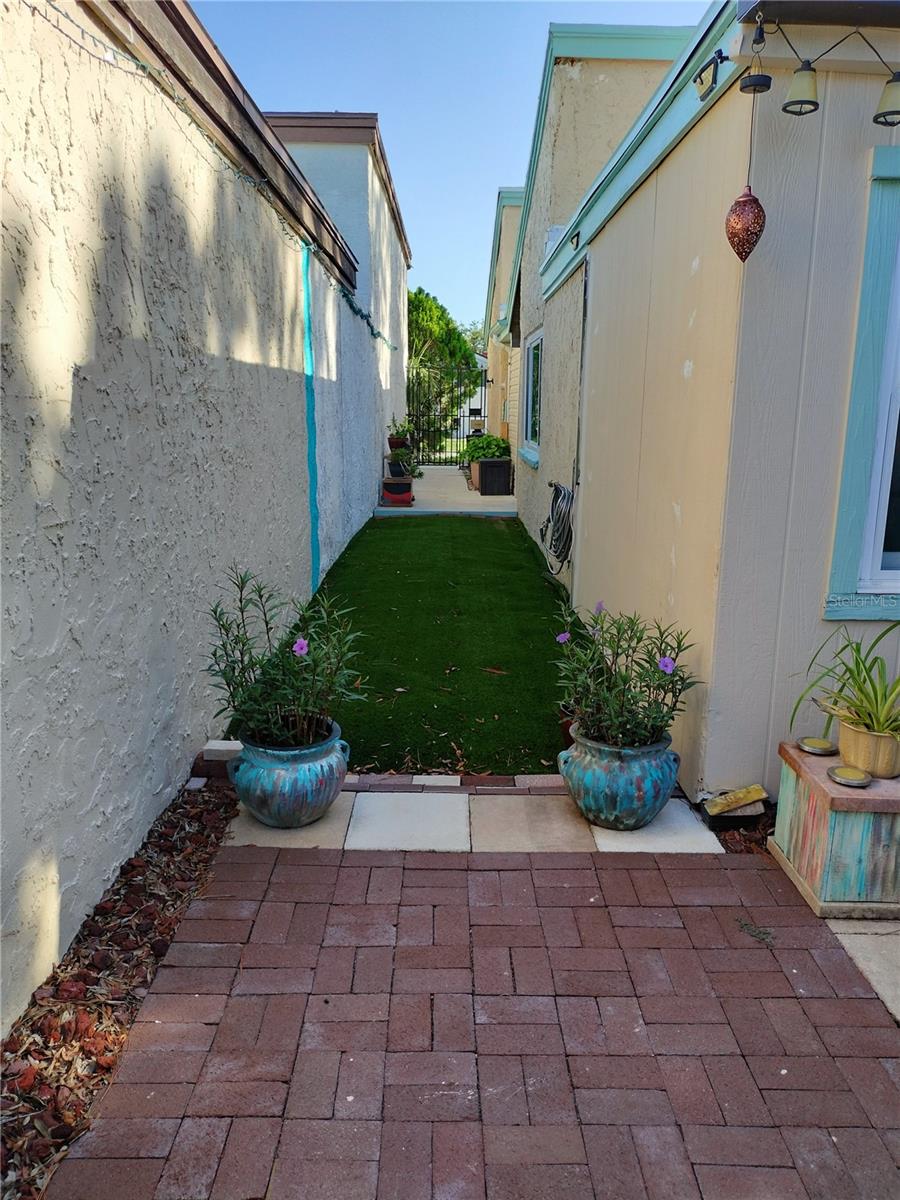 Looking at the entrance gate from back patio