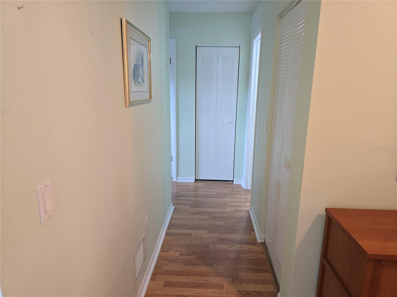 HALLWAY TO THE BEDROOMS.