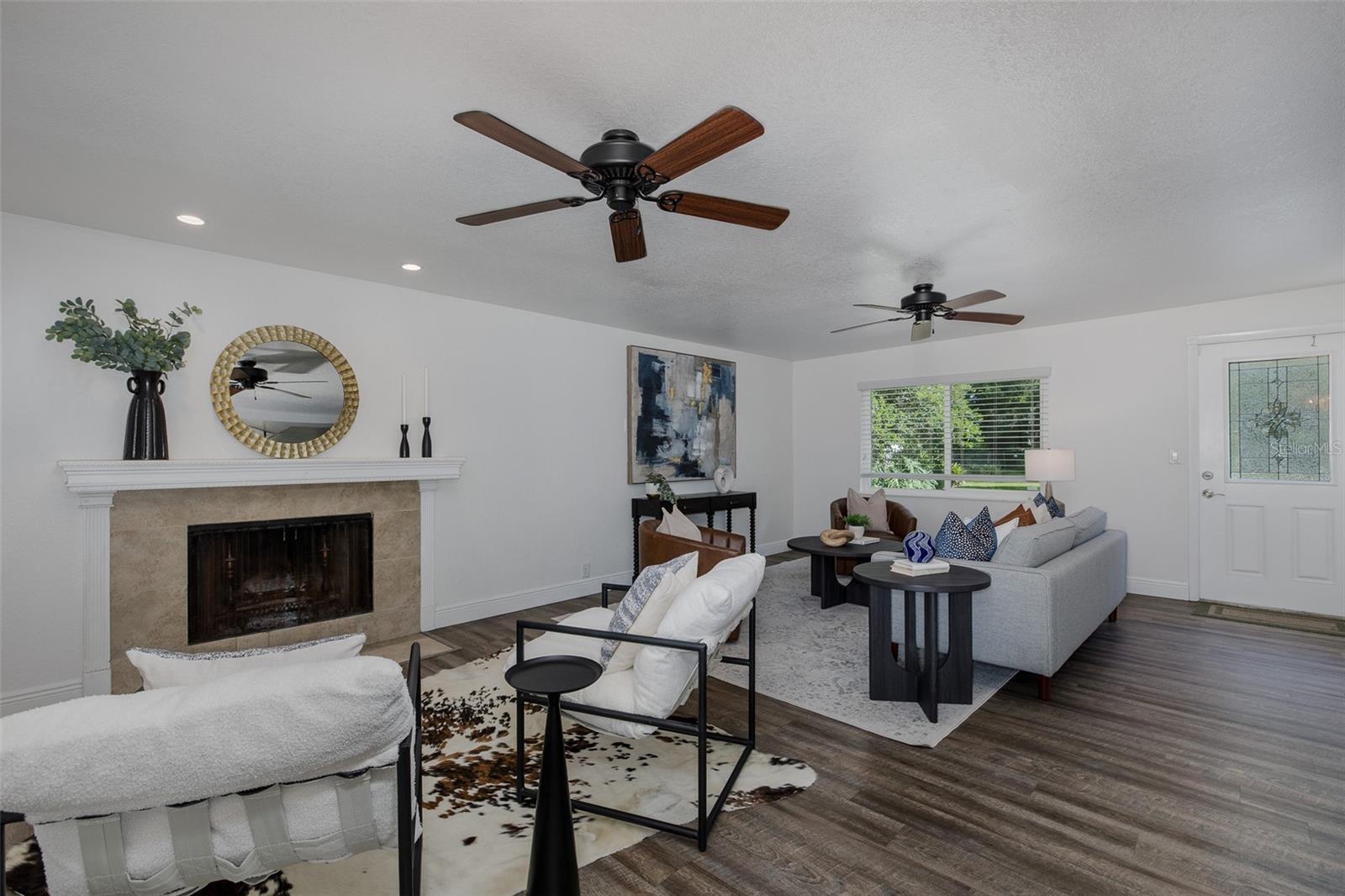 Family room with wood burning fireplace