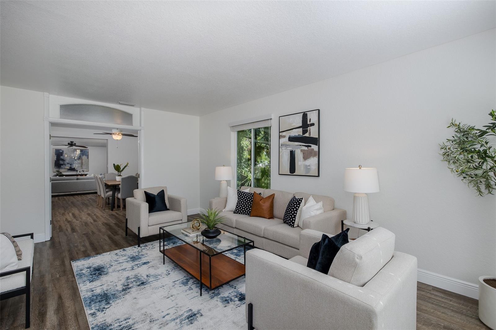 Living Room leads to Dining Room through French doors