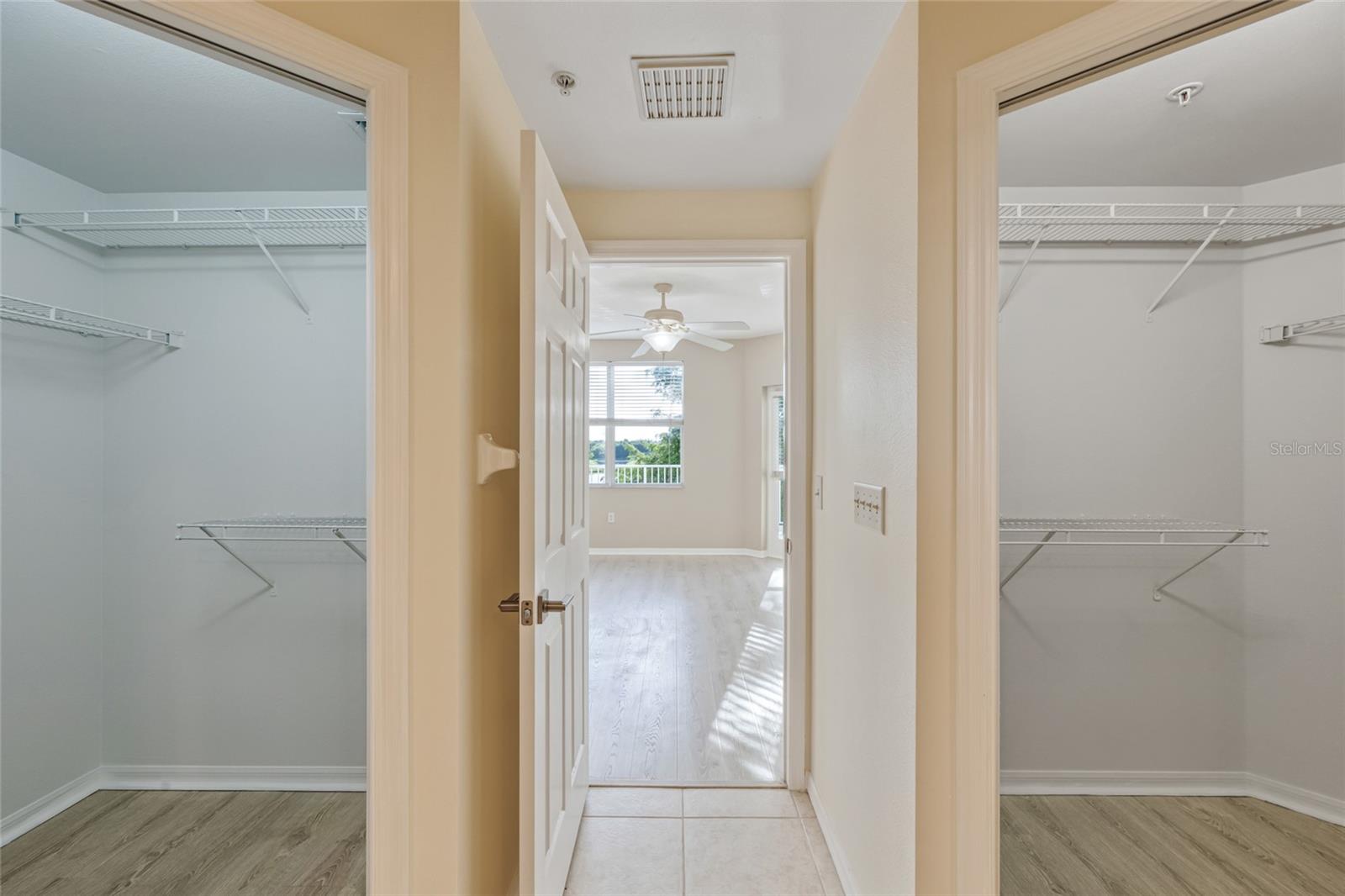 His & Hers spacious walk-in closets in Primary En Suite.