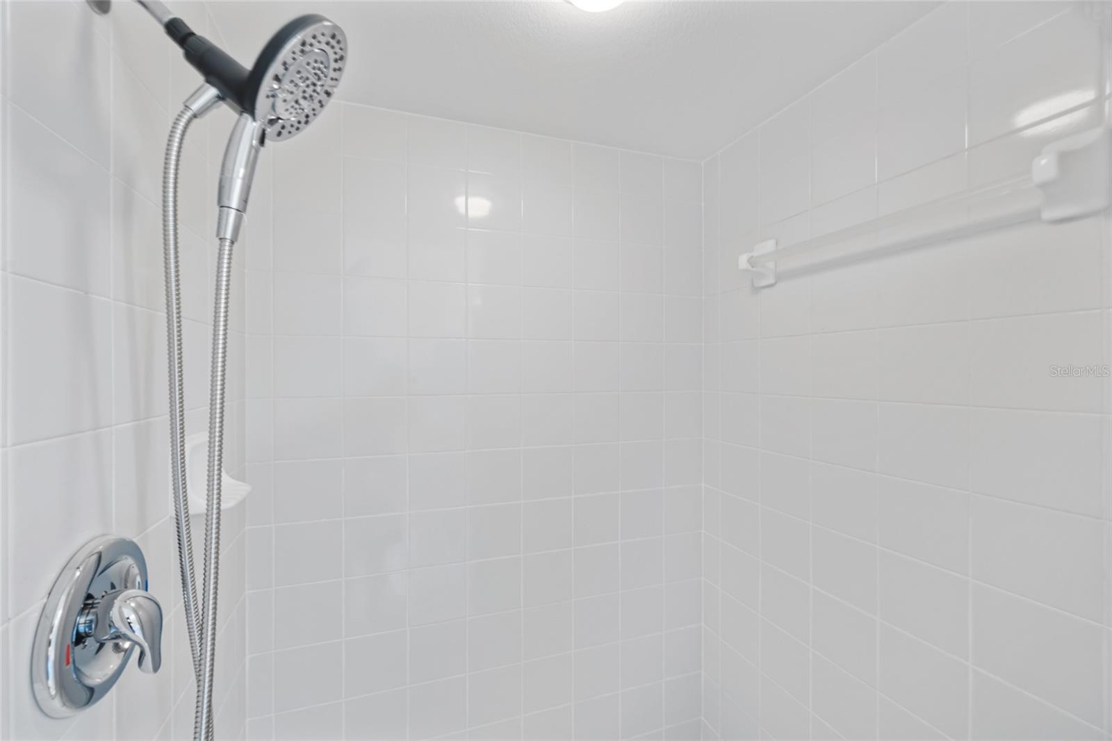Primary Shower with new Rainhead & handheld shower heads.