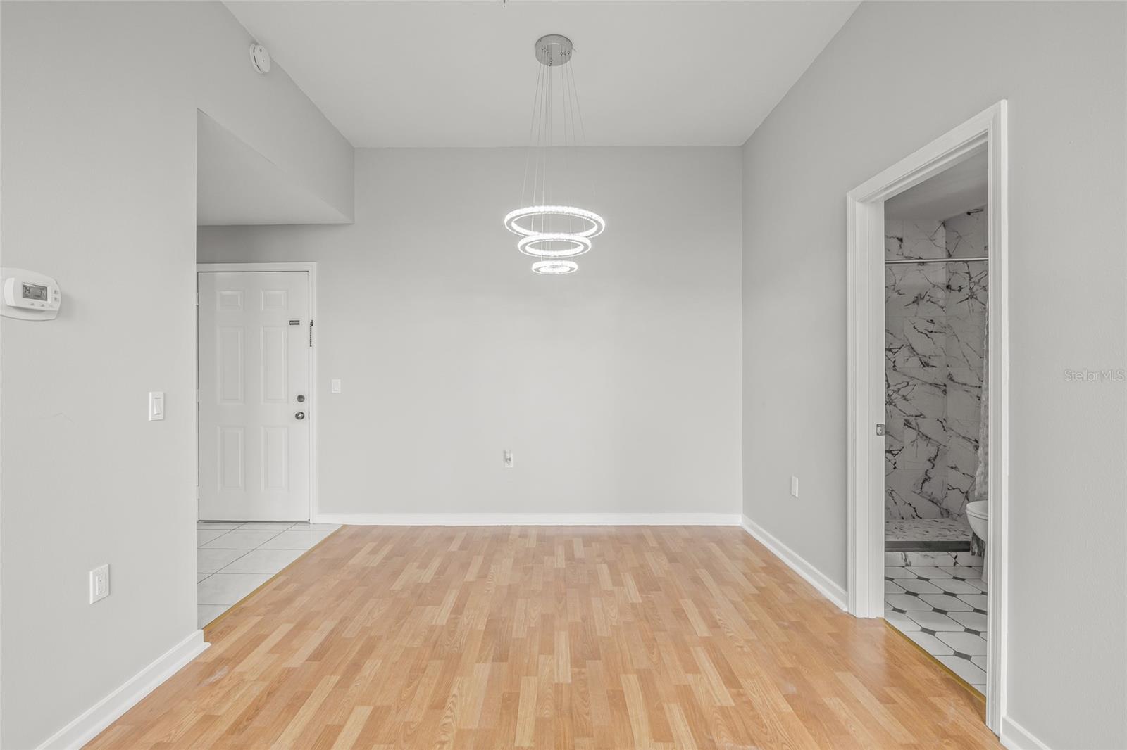 Notice the entire condo is freshly painted ! Here is the Living Room and Dining Room